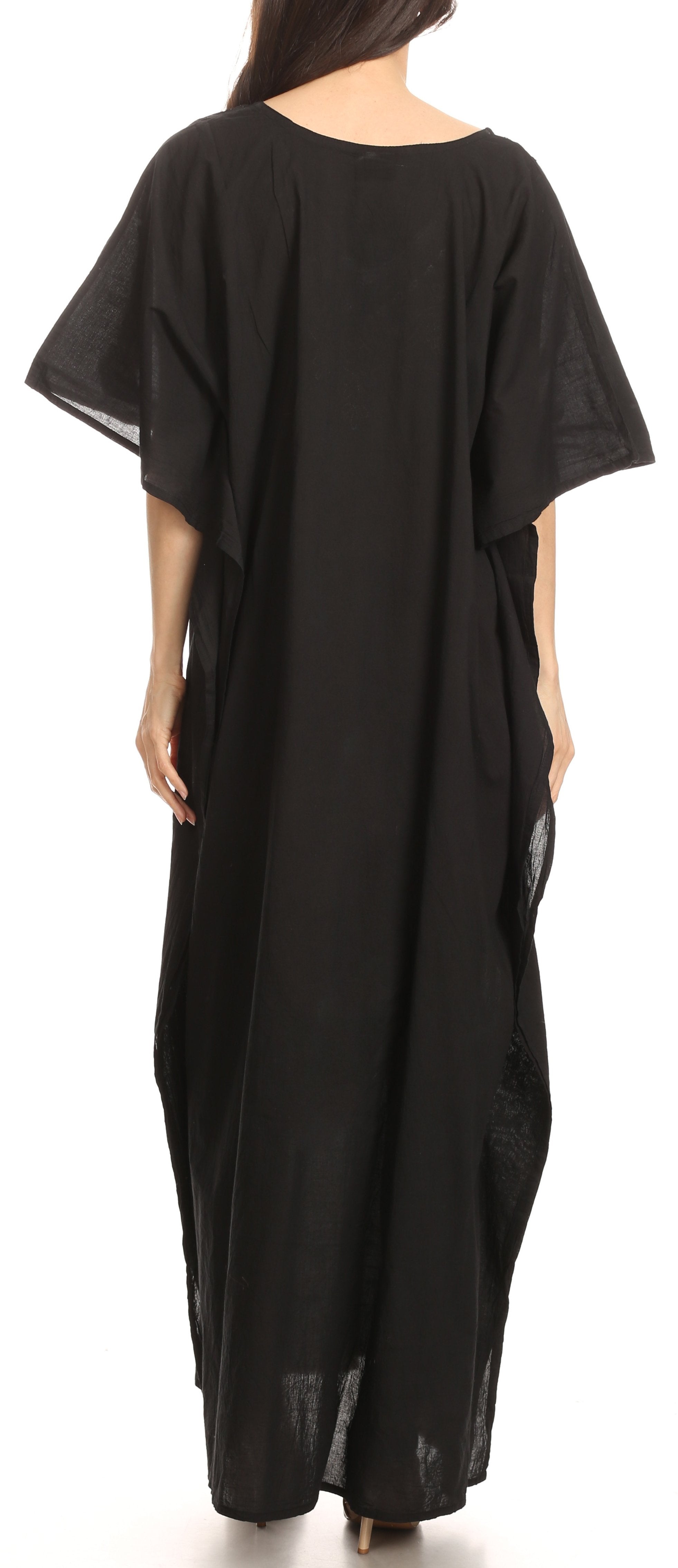 Black caftan worn by a person on a white background