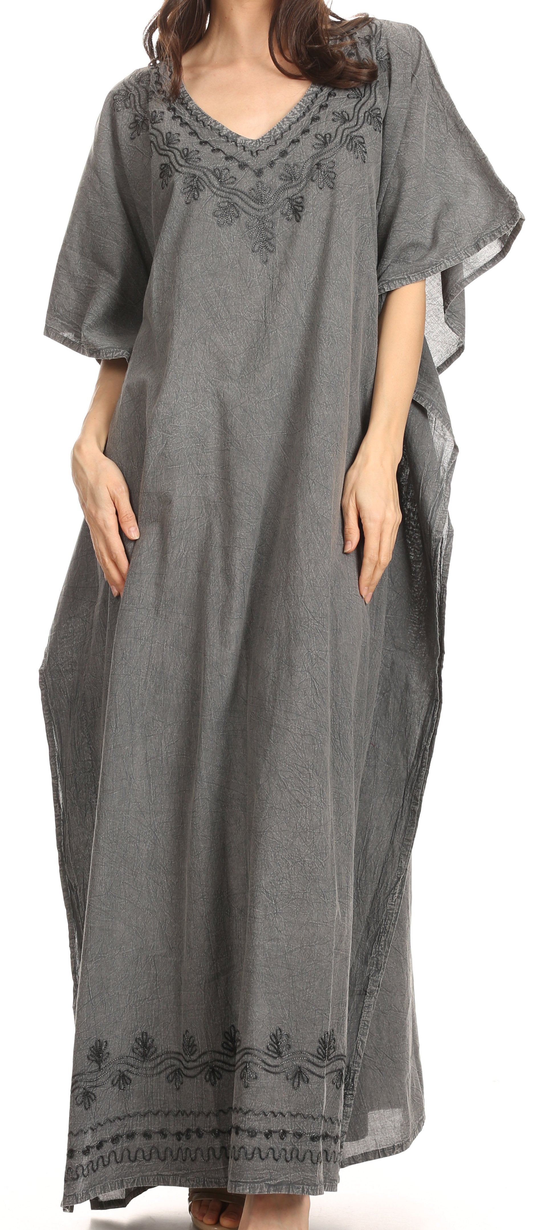 Gray caftan with embroidery on a white background