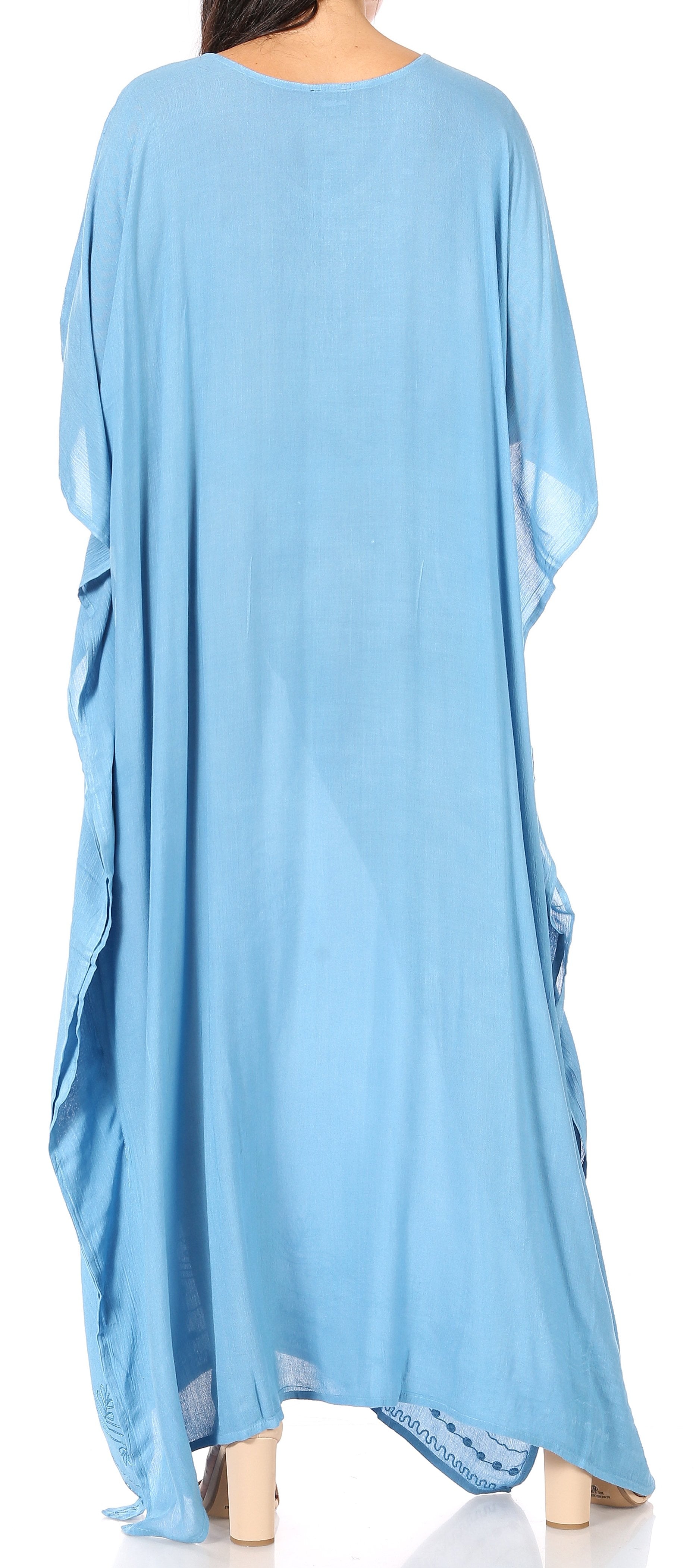 Light blue long-sleeve dress worn by a person on a white background