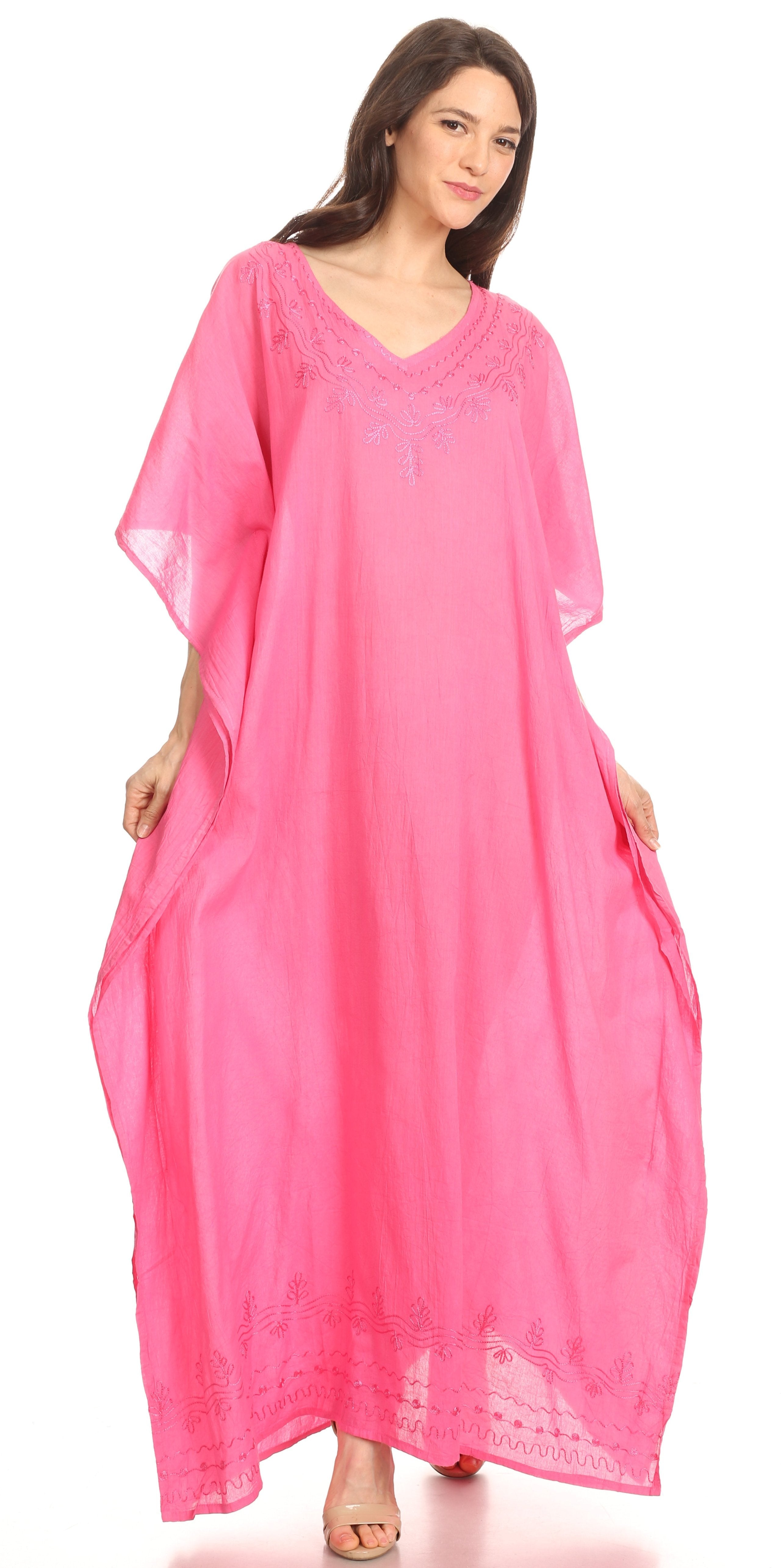 Woman wearing a pink caftan on a white background