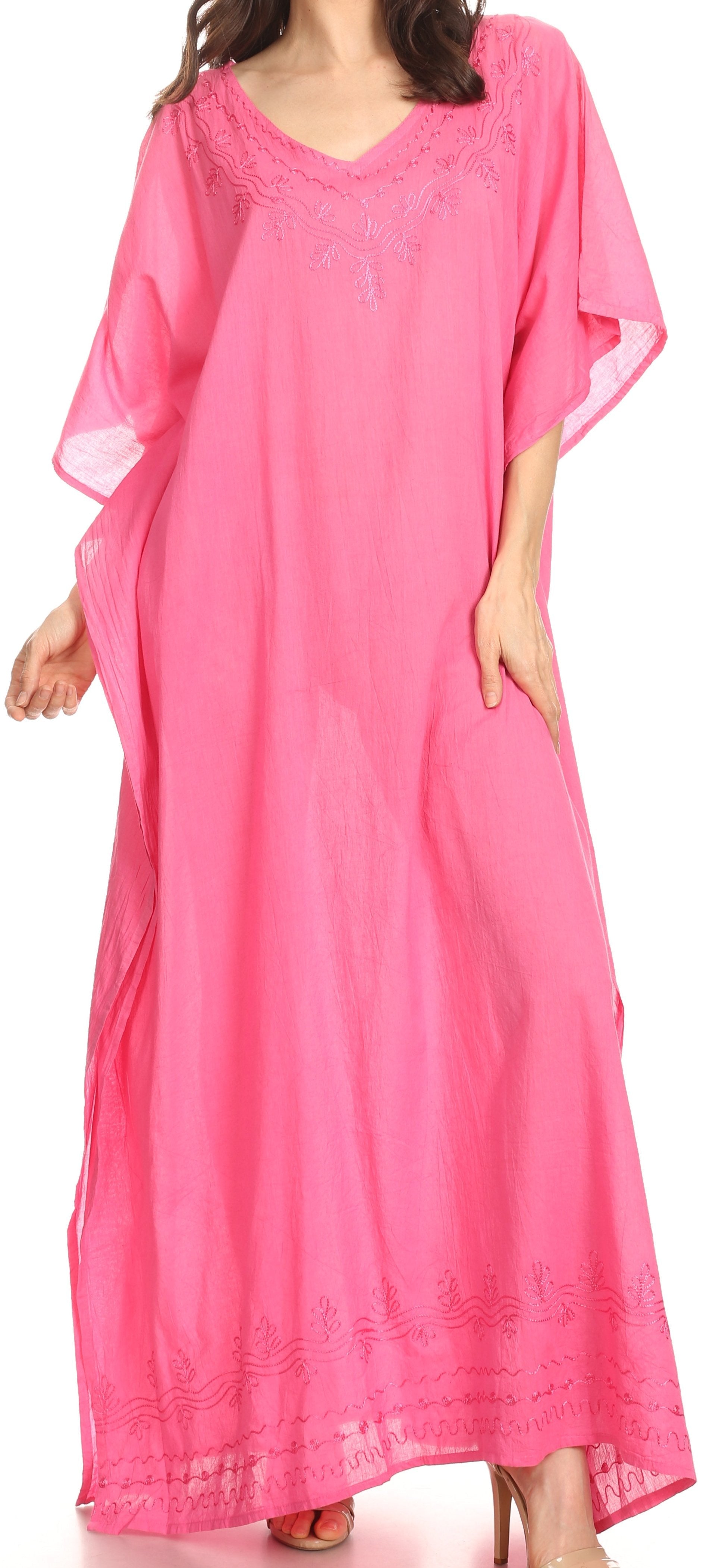Pink long dress with lace details worn by a model