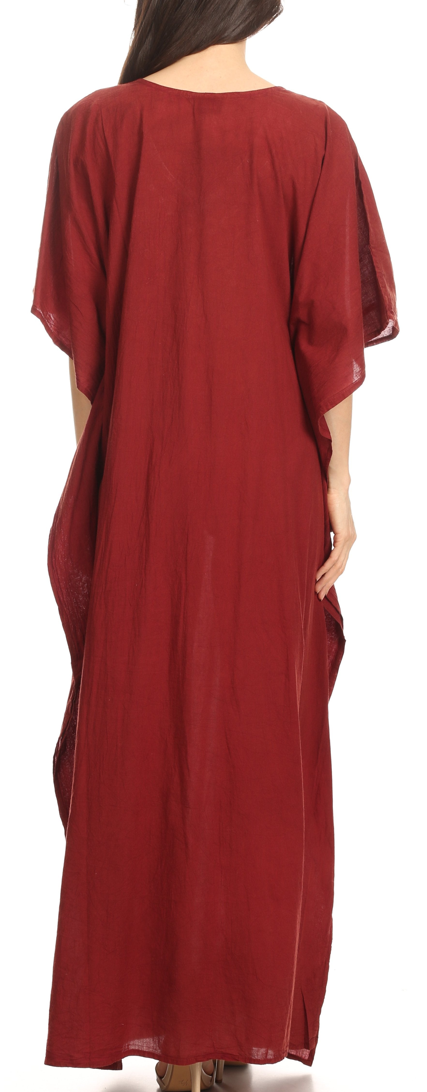 Red caftan worn by a person on a white background