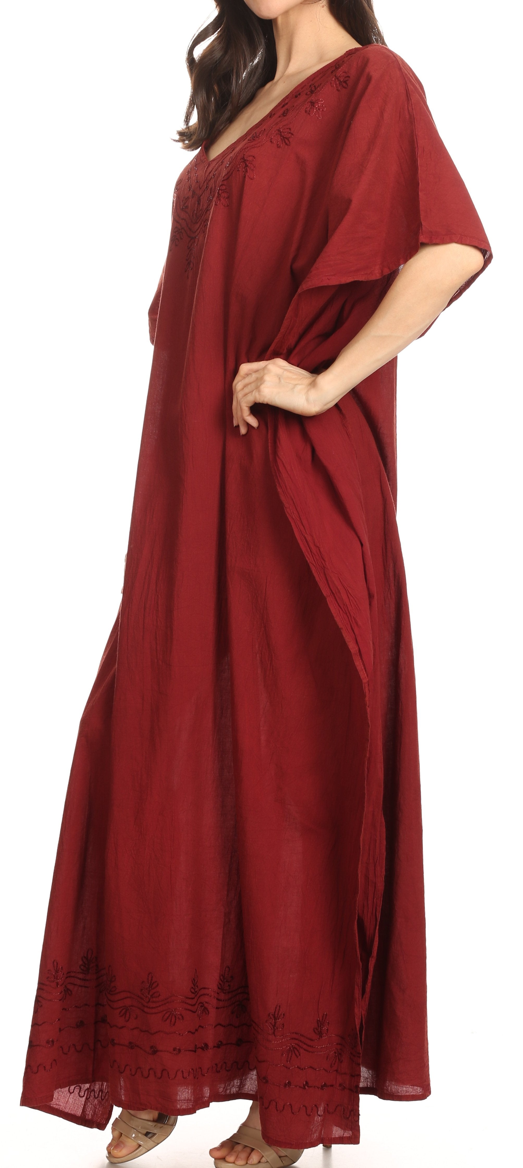 Red dress worn by a model on a white background