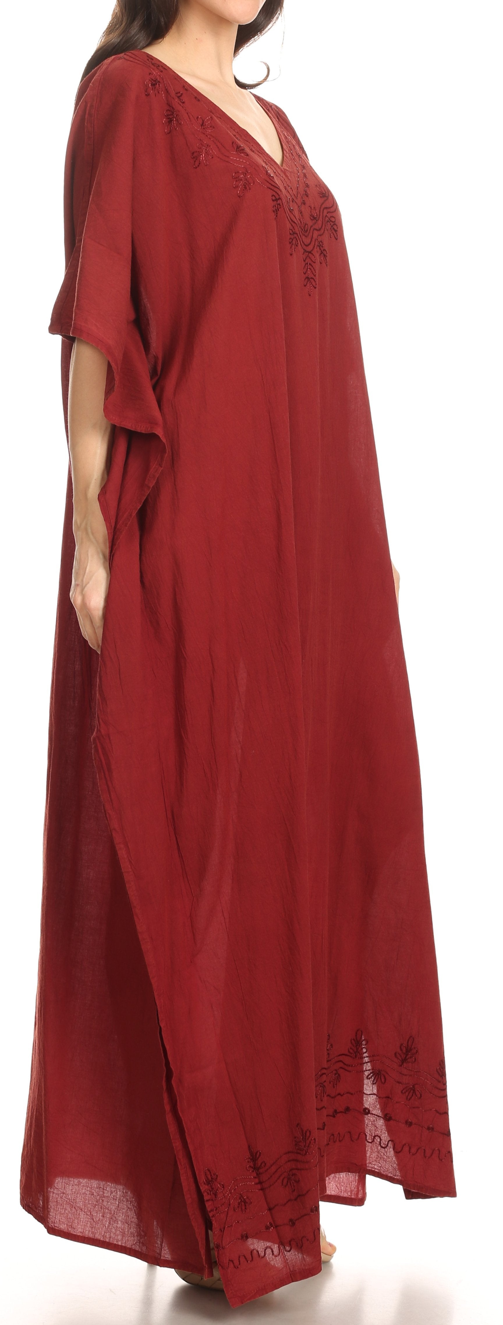 Red maxi dress with lace details on a white background