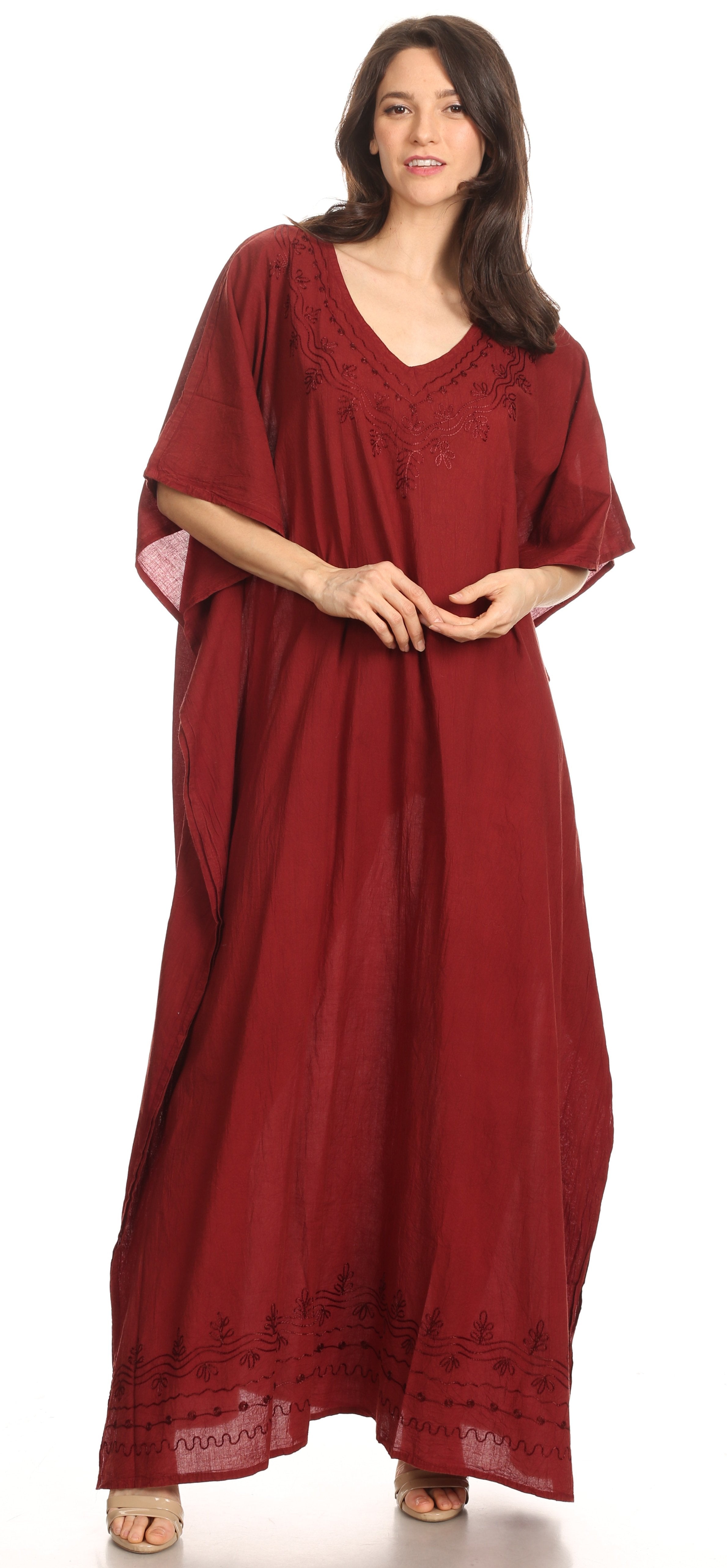 Woman wearing a red caftan on a white background