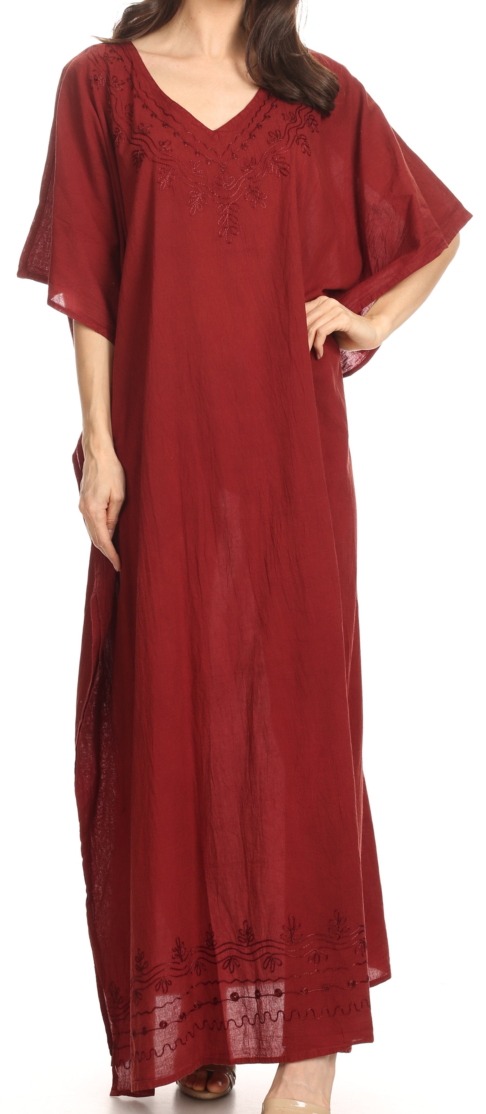 Red caftan with lace details on a white background