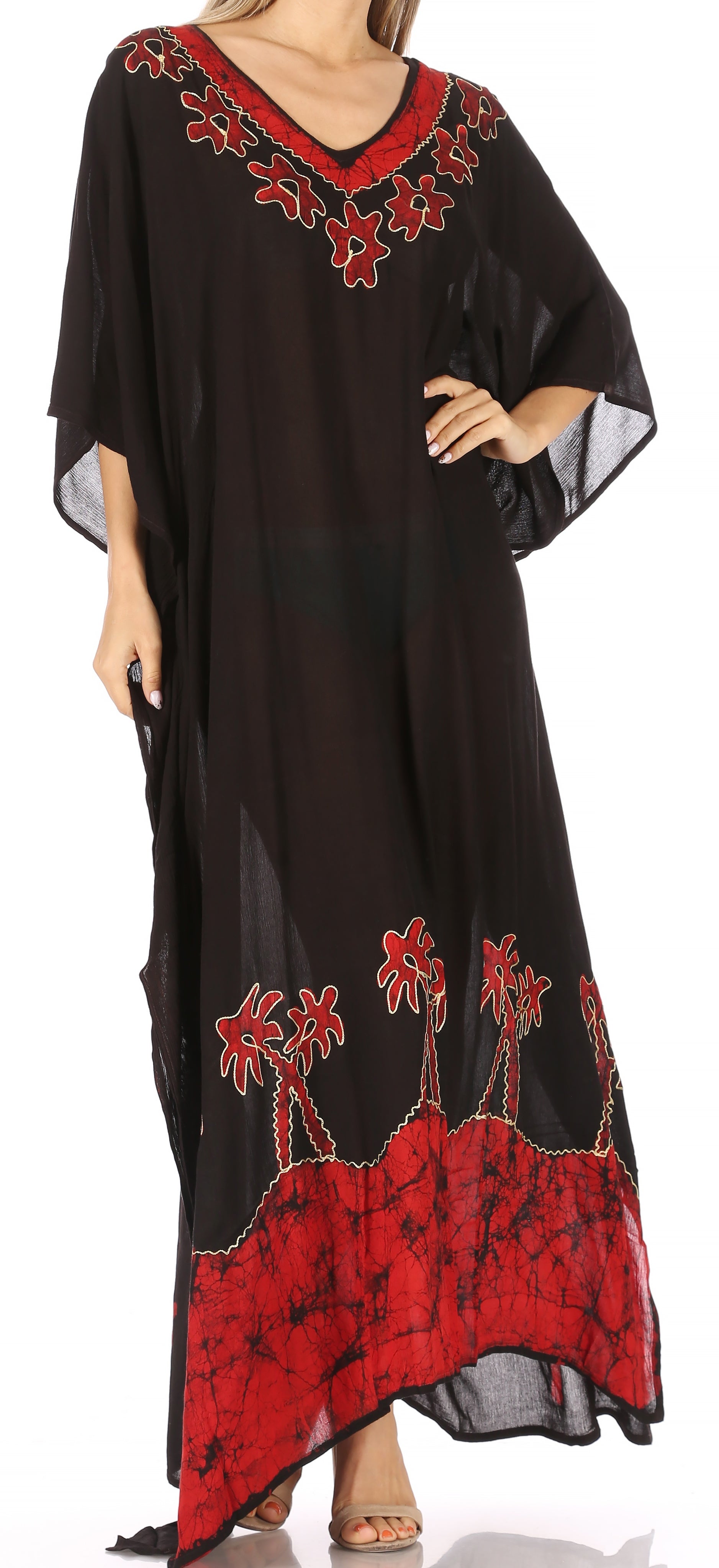 Black dress with red floral embroidery on a white background