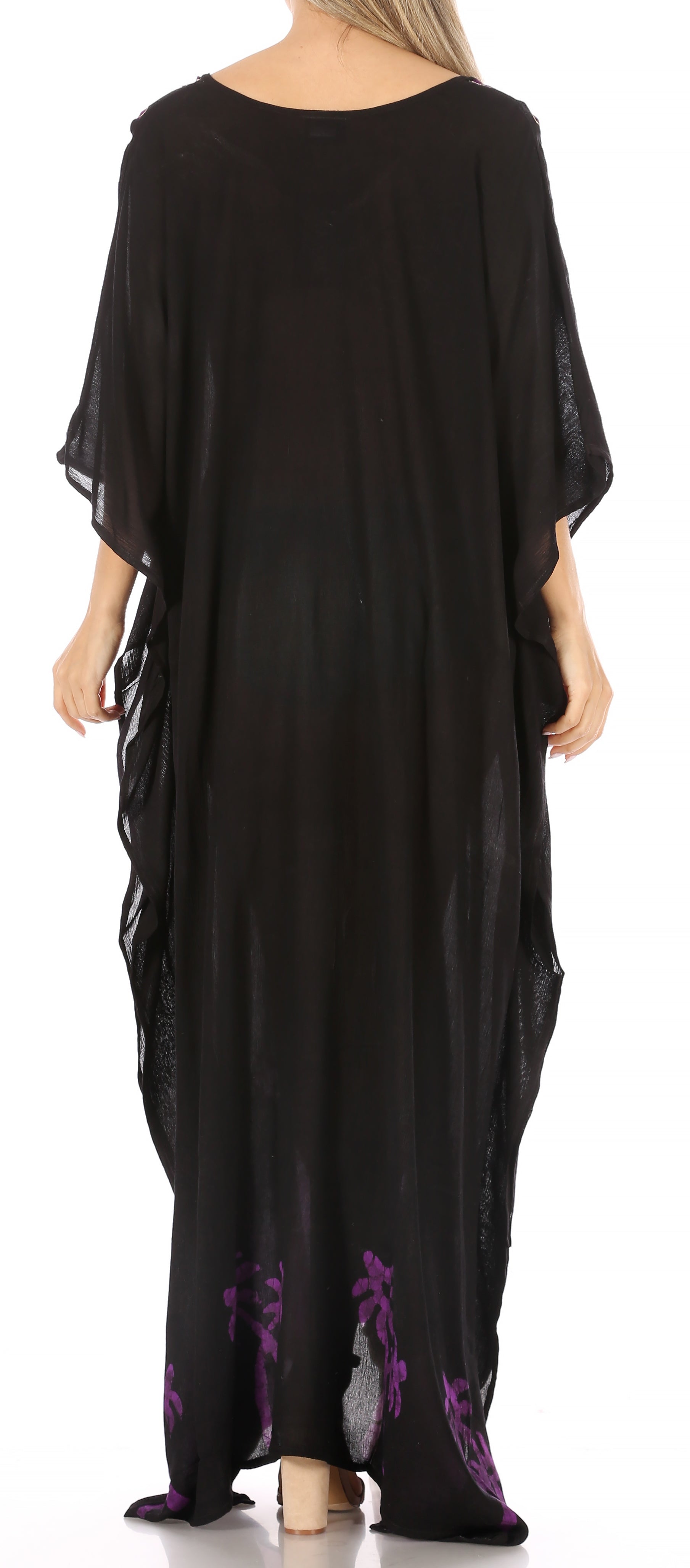 Black caftan with purple floral embroidery on a white background