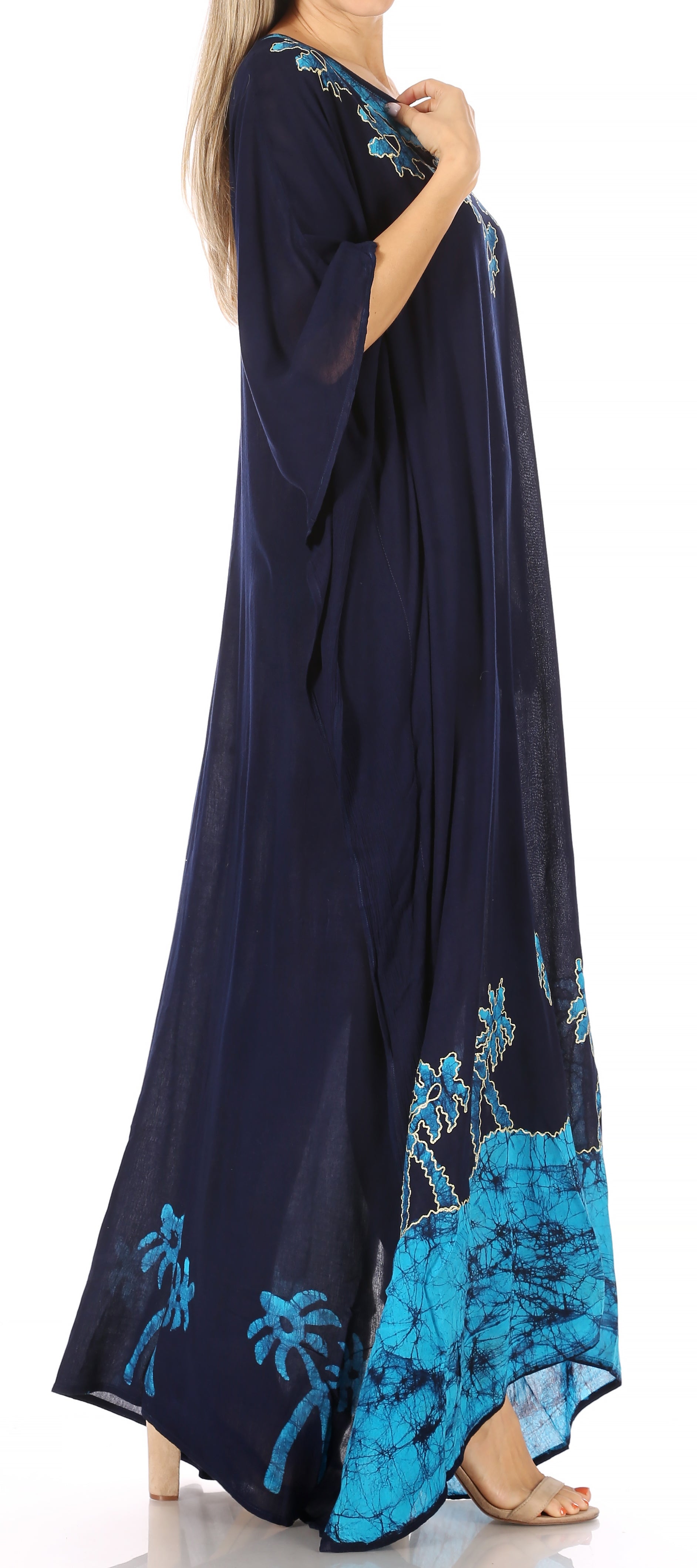 Navy blue maxi dress with turquoise floral embroidery on a white background