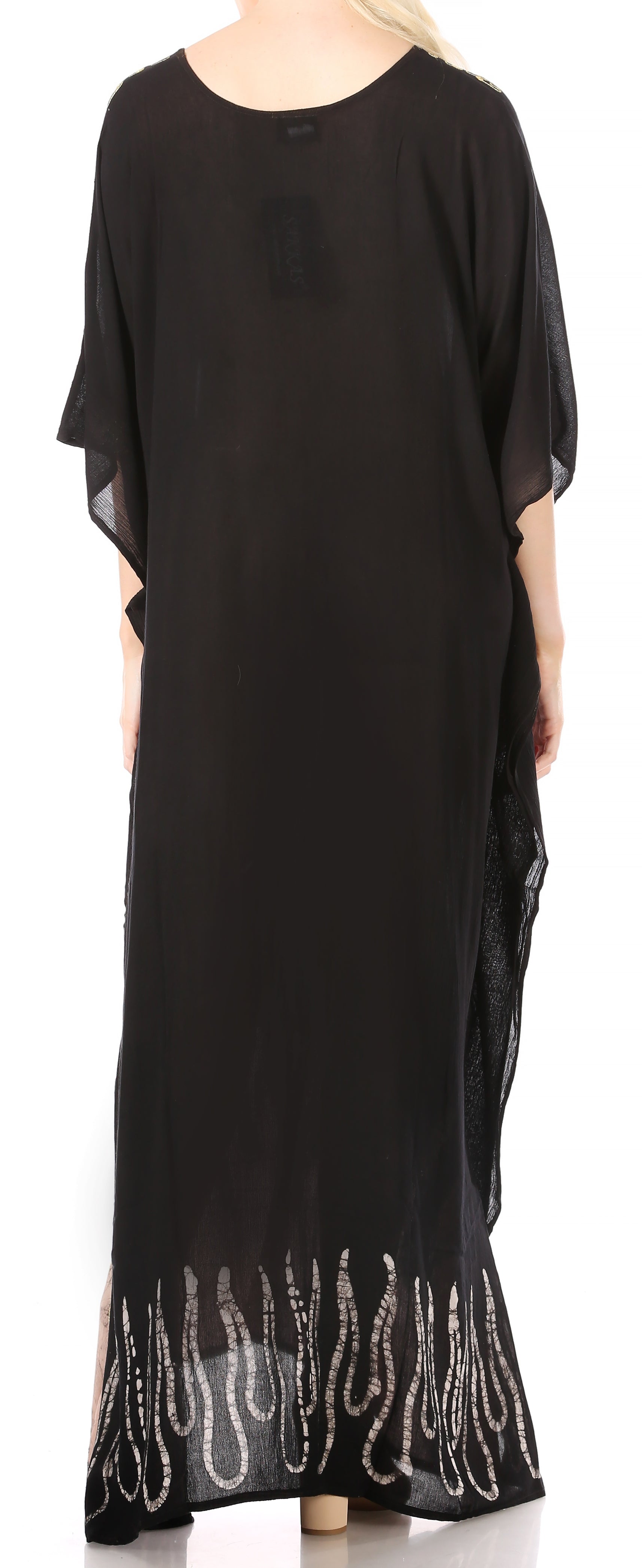 Black dress with silver embroidery on a plain background