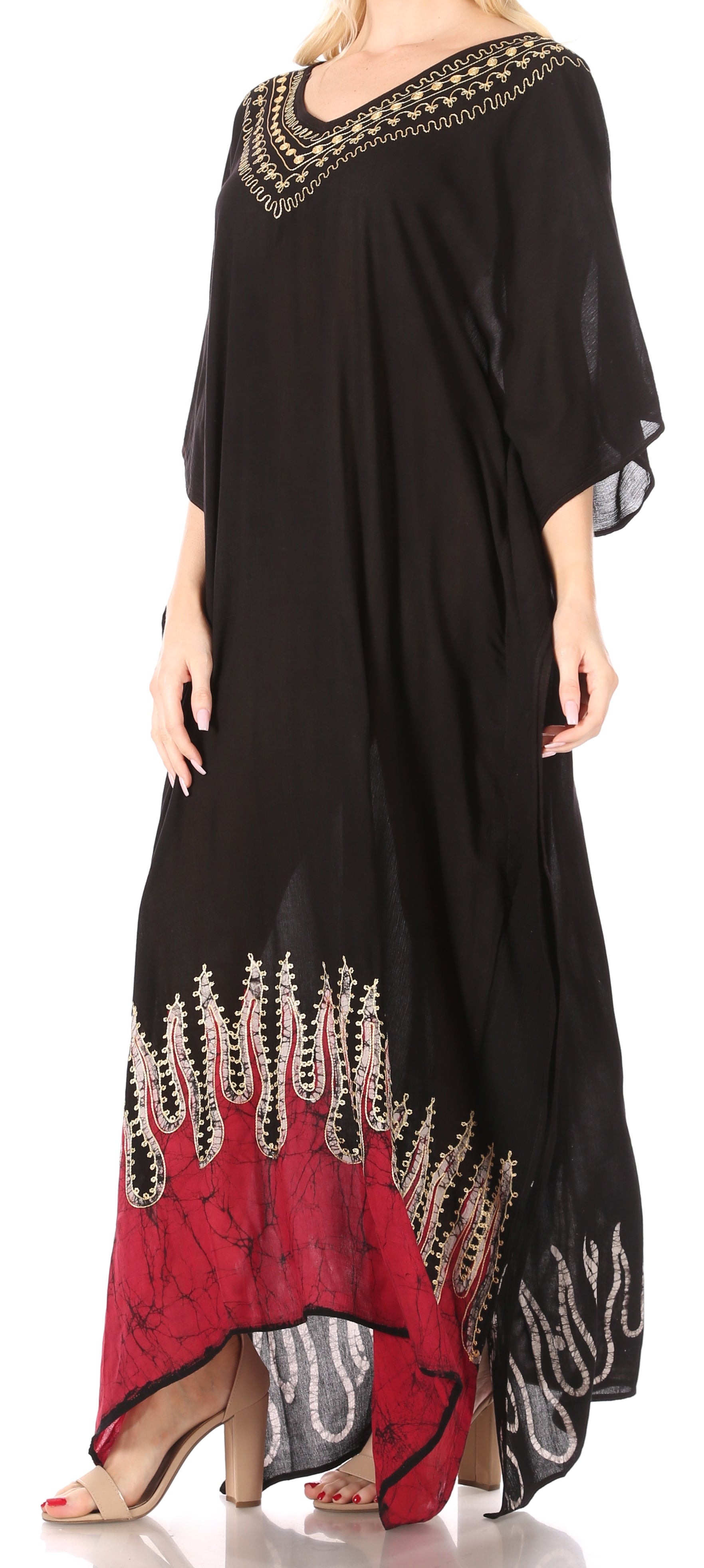 Black and red dress with intricate embroidery on a white background