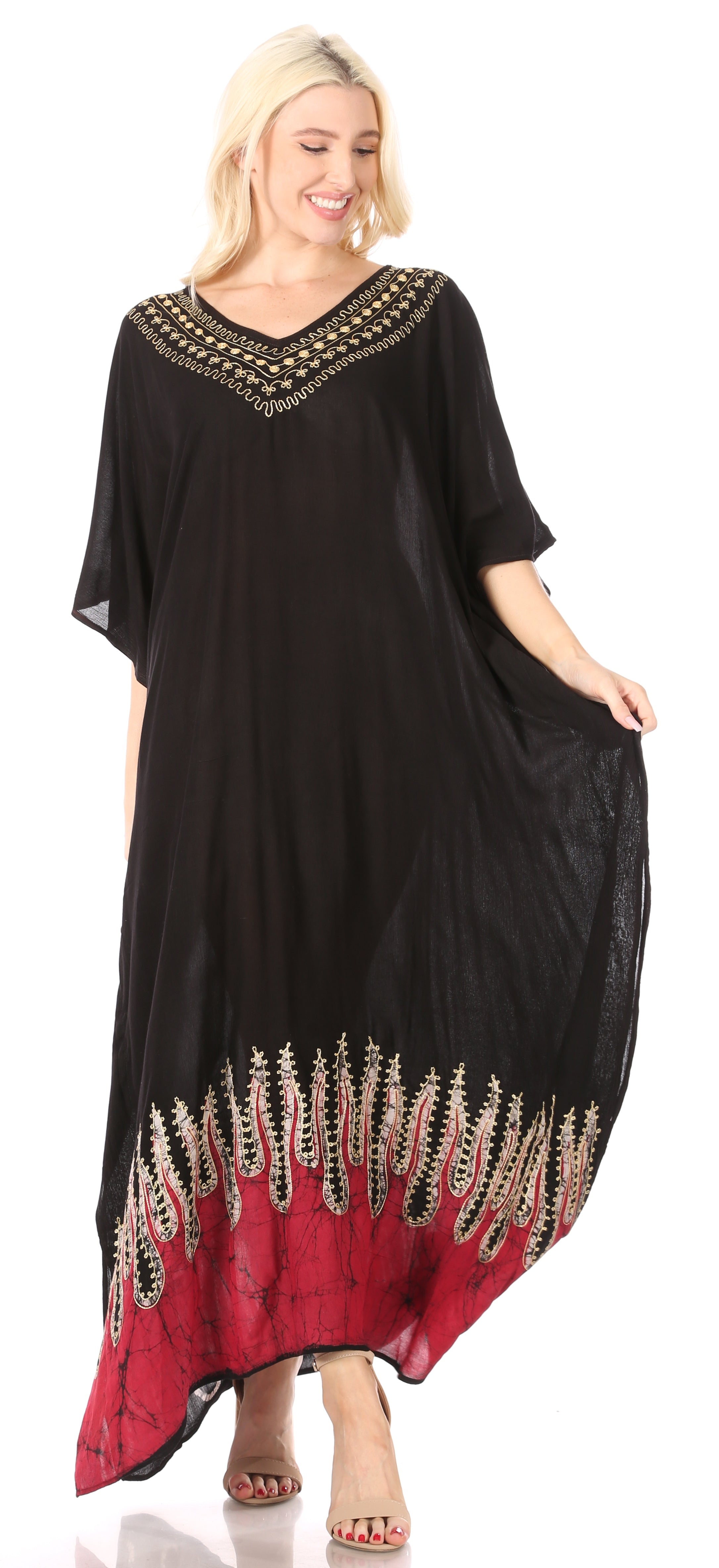 Black and red dress with gold embellishments on a white background