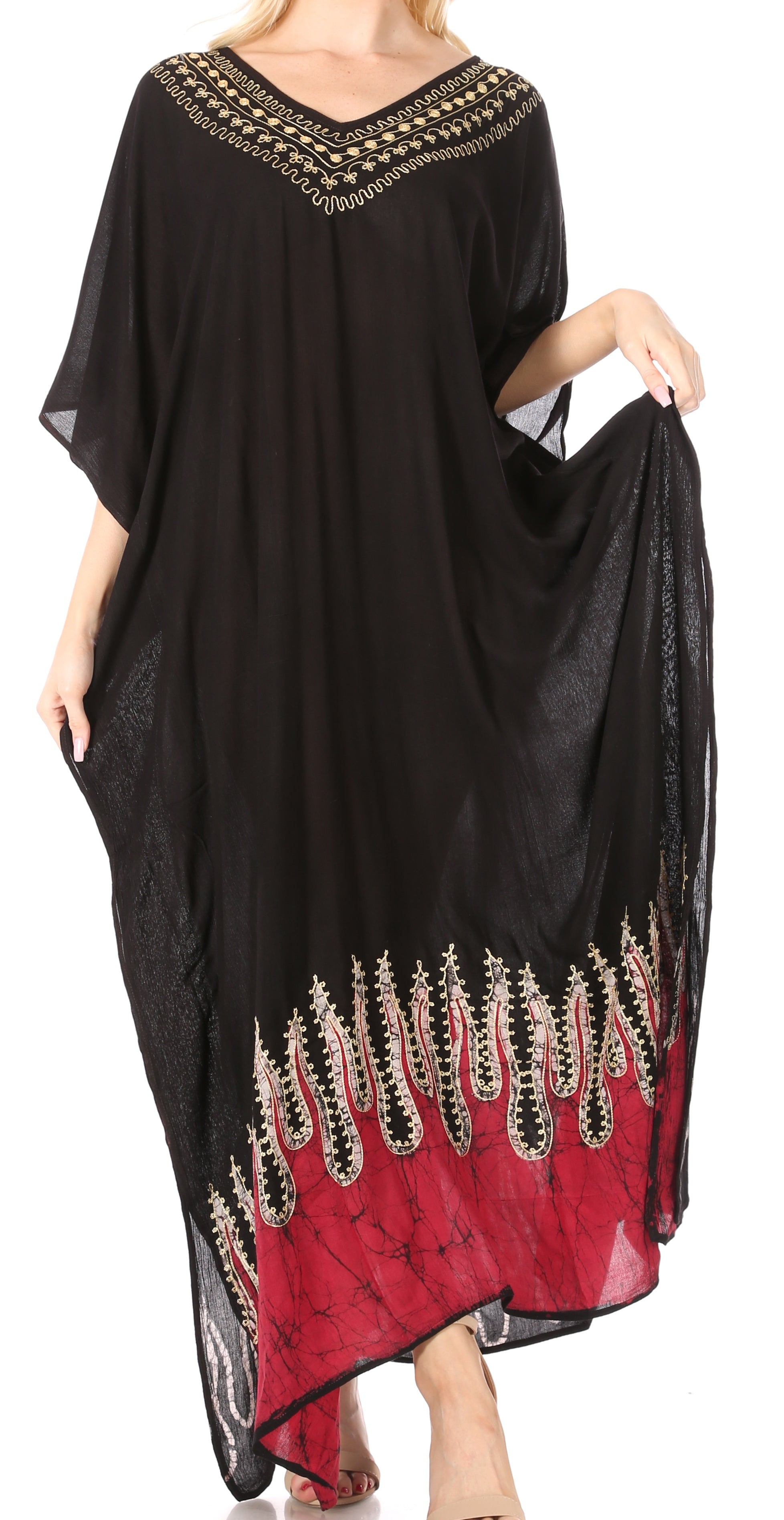 Black and red dress with intricate beadwork on a white background