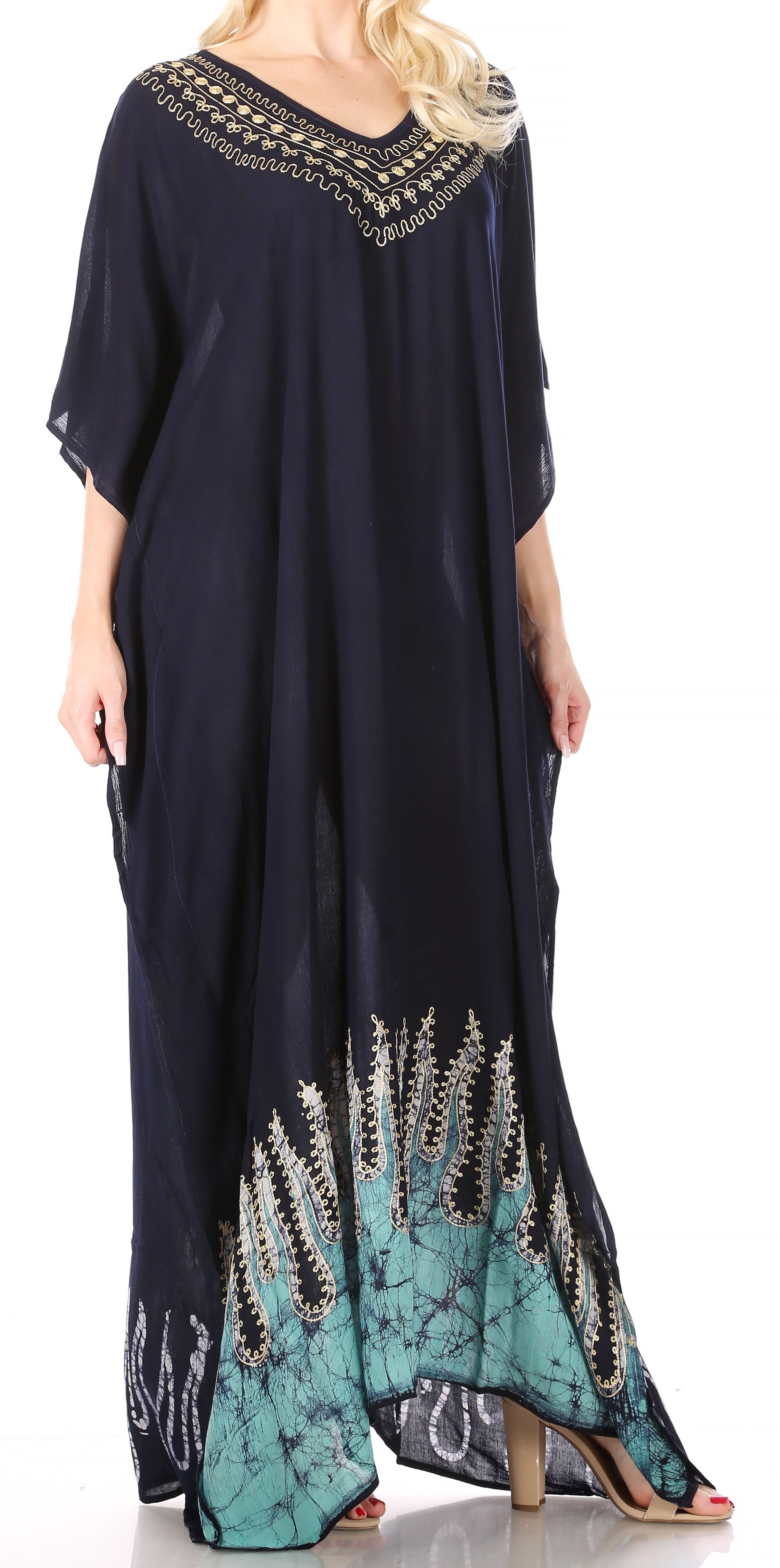 Navy blue dress with turquoise accents and embellishments on a white background