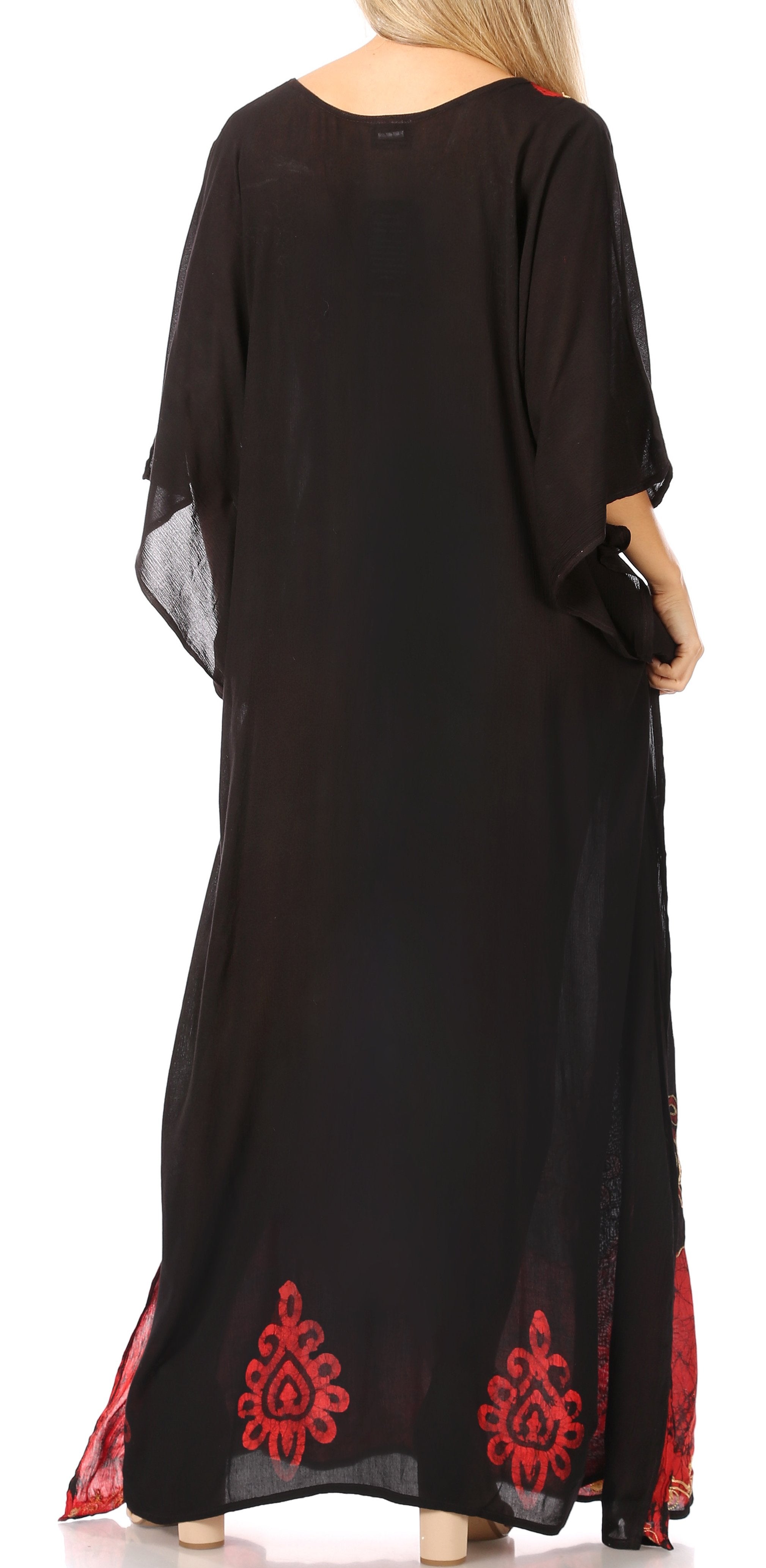 Black dress with red embroidery on a white background