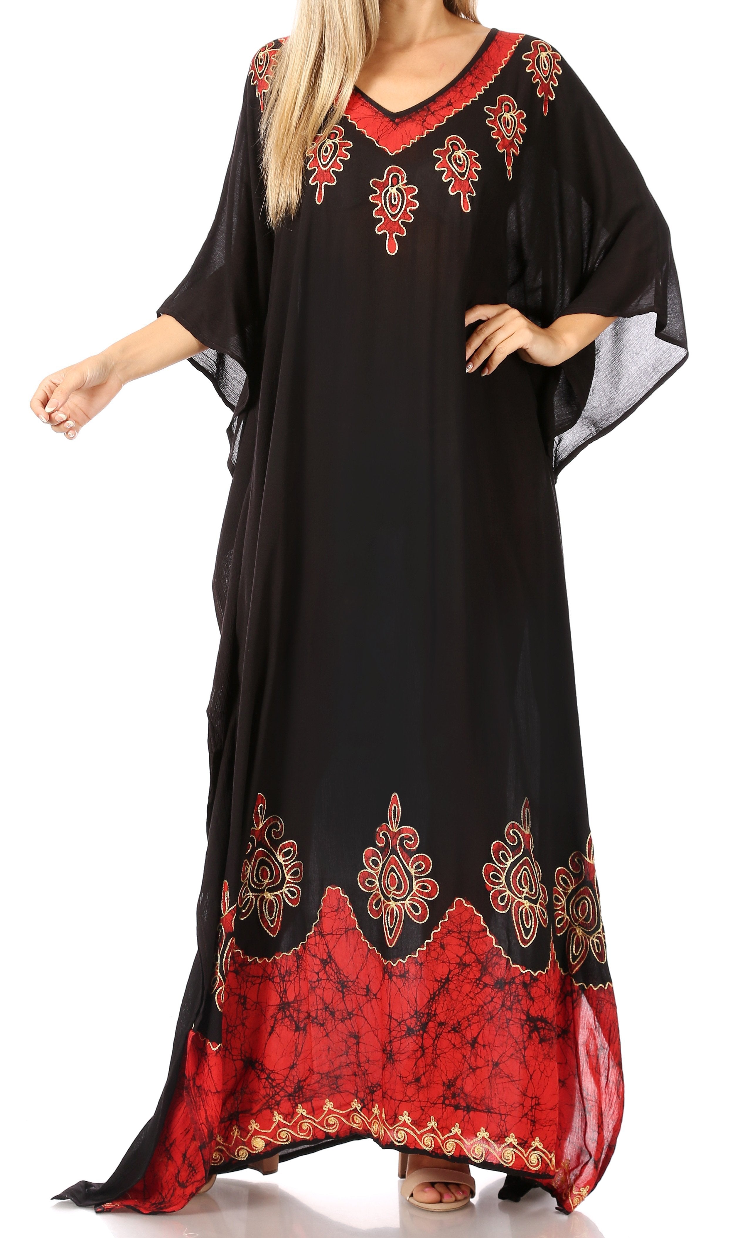 Black dress with red and gold embroidery on a white background