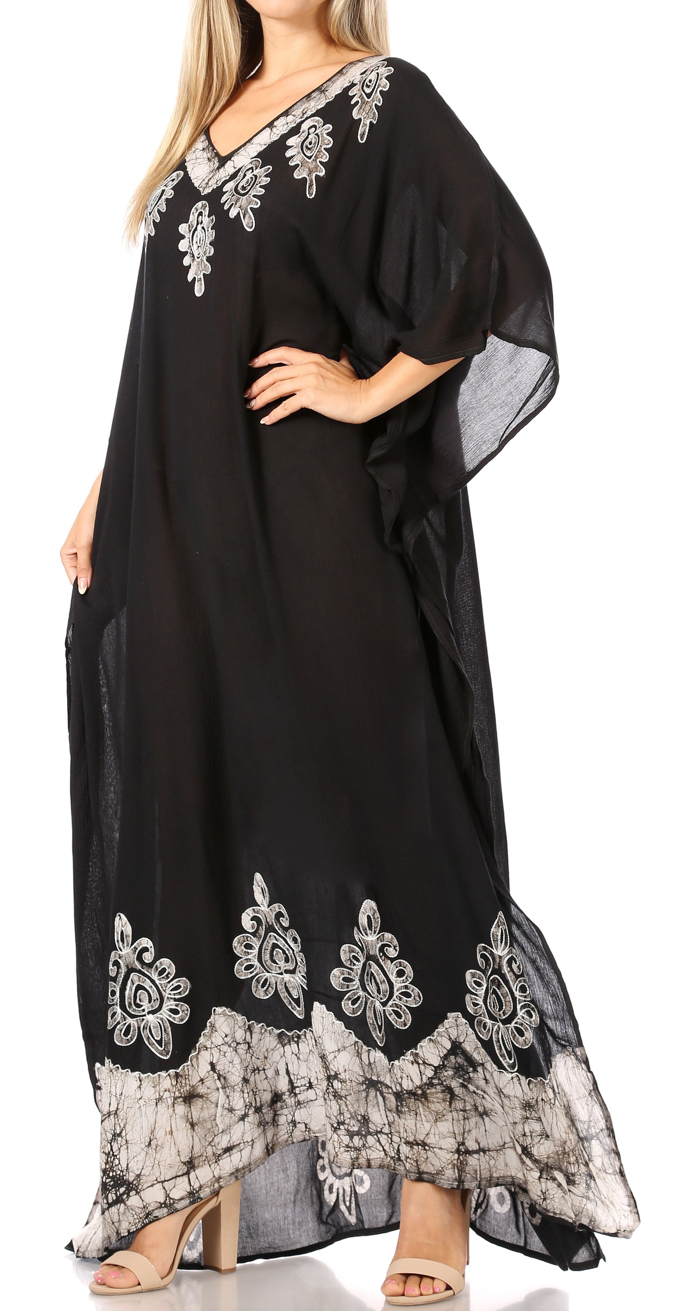 Black caftan with white embroidery on a white background