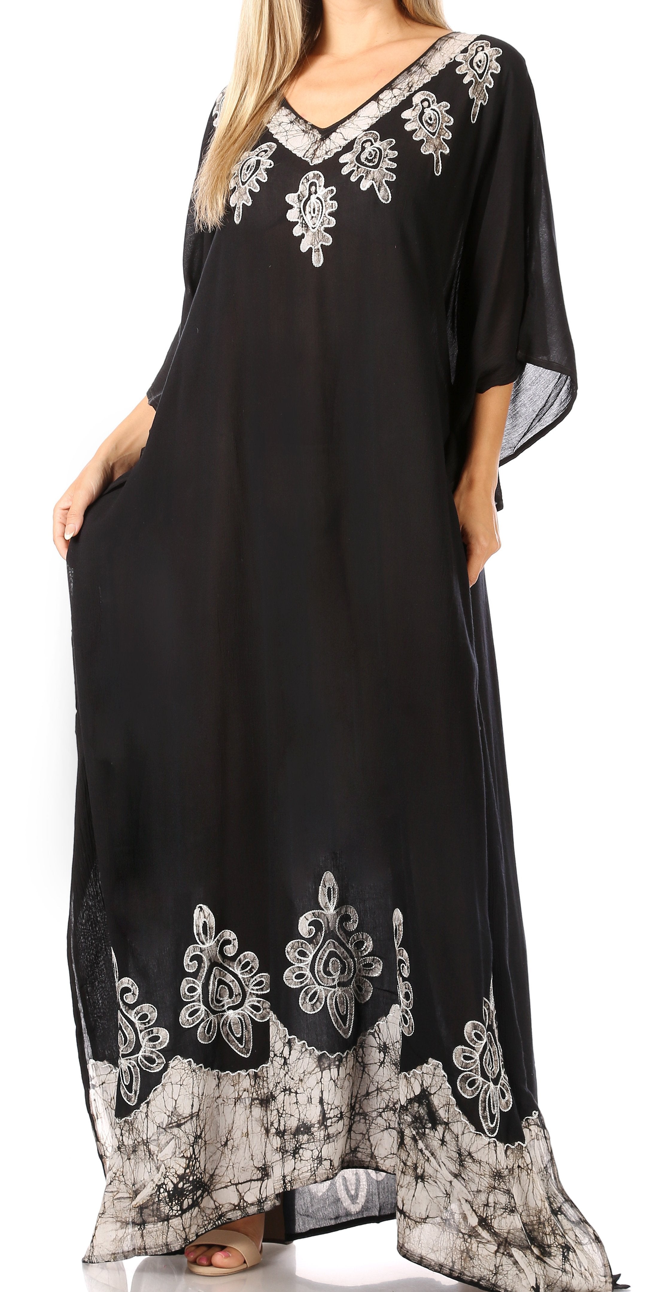 Black caftan with white embroidery on a white background