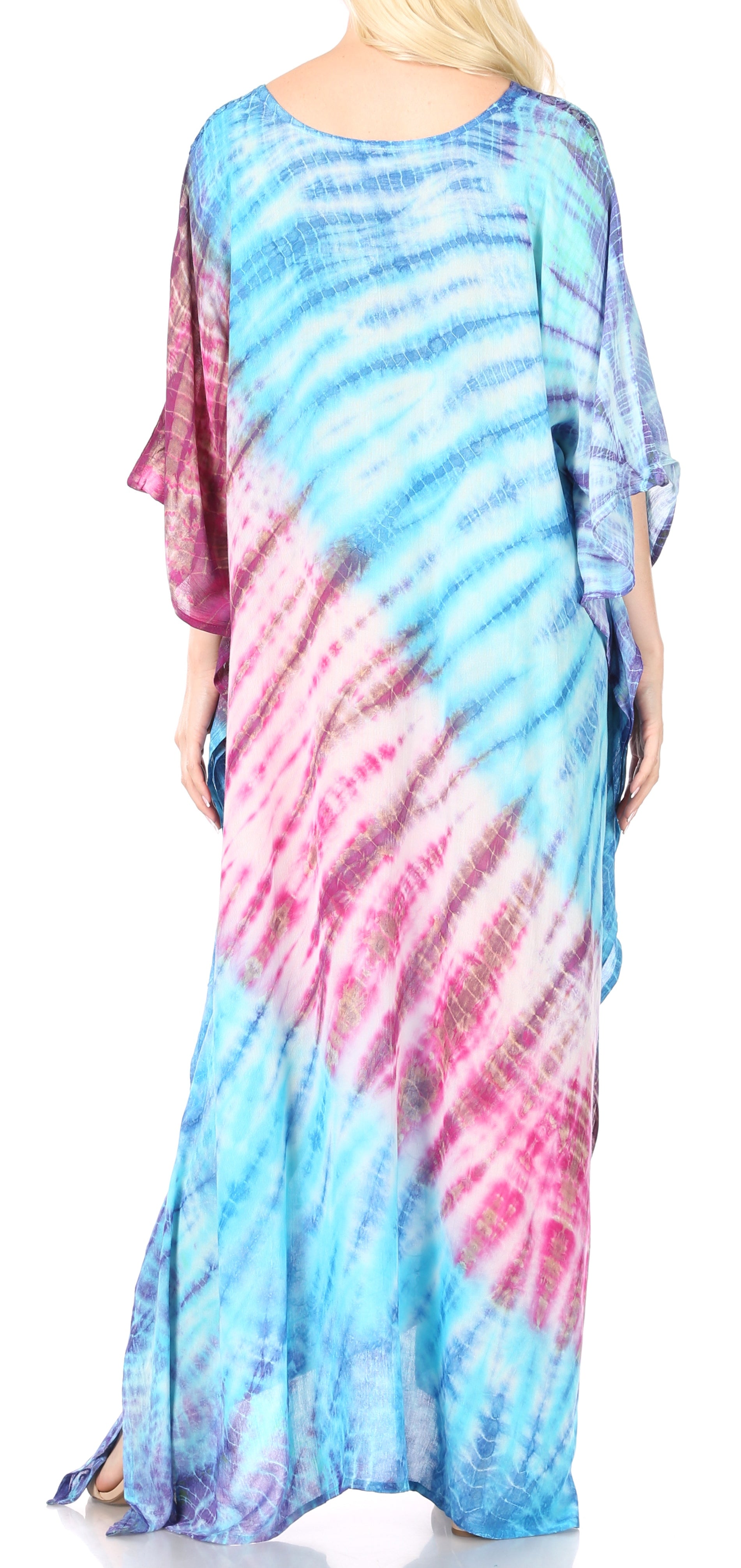 Woman wearing a tie-dye dress with blue and pink gradient on a white background