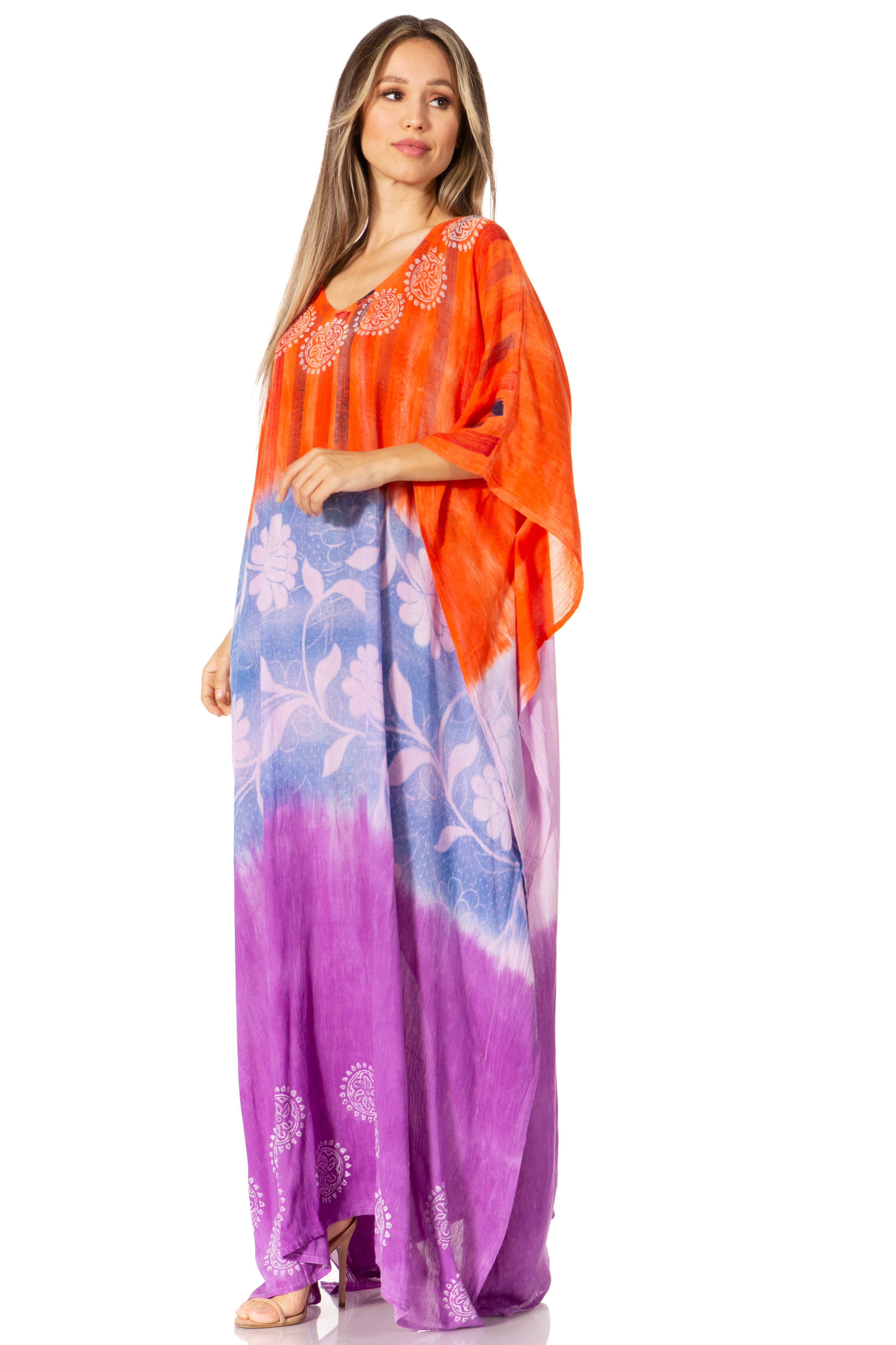 Woman wearing a colorful dress with an orange top and blue-purple gradient skirt on a white background