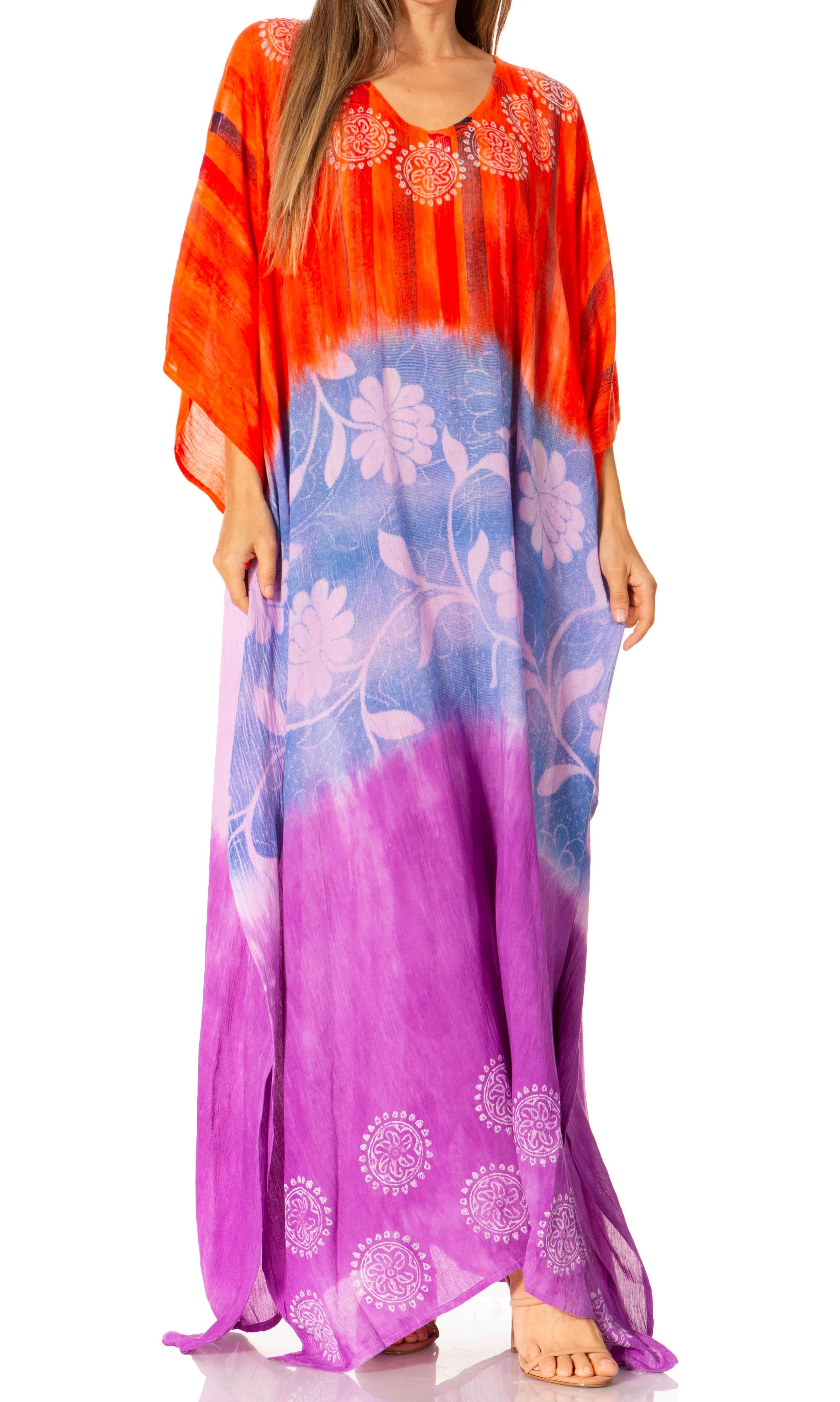 Woman wearing a colorful dress with an orange top and purple bottom on a white background