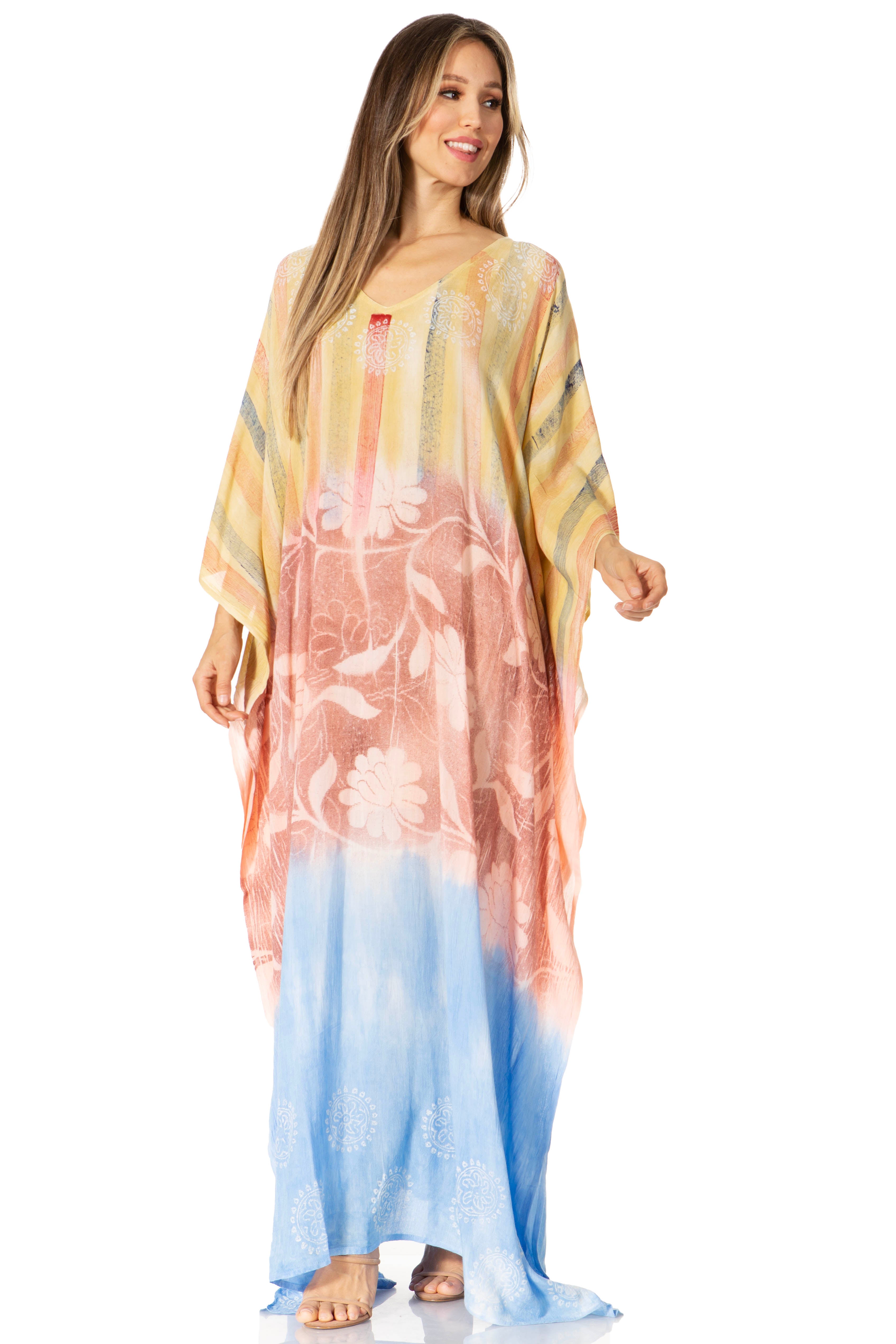 Woman wearing a colorful dress with a gradient effect on a white background