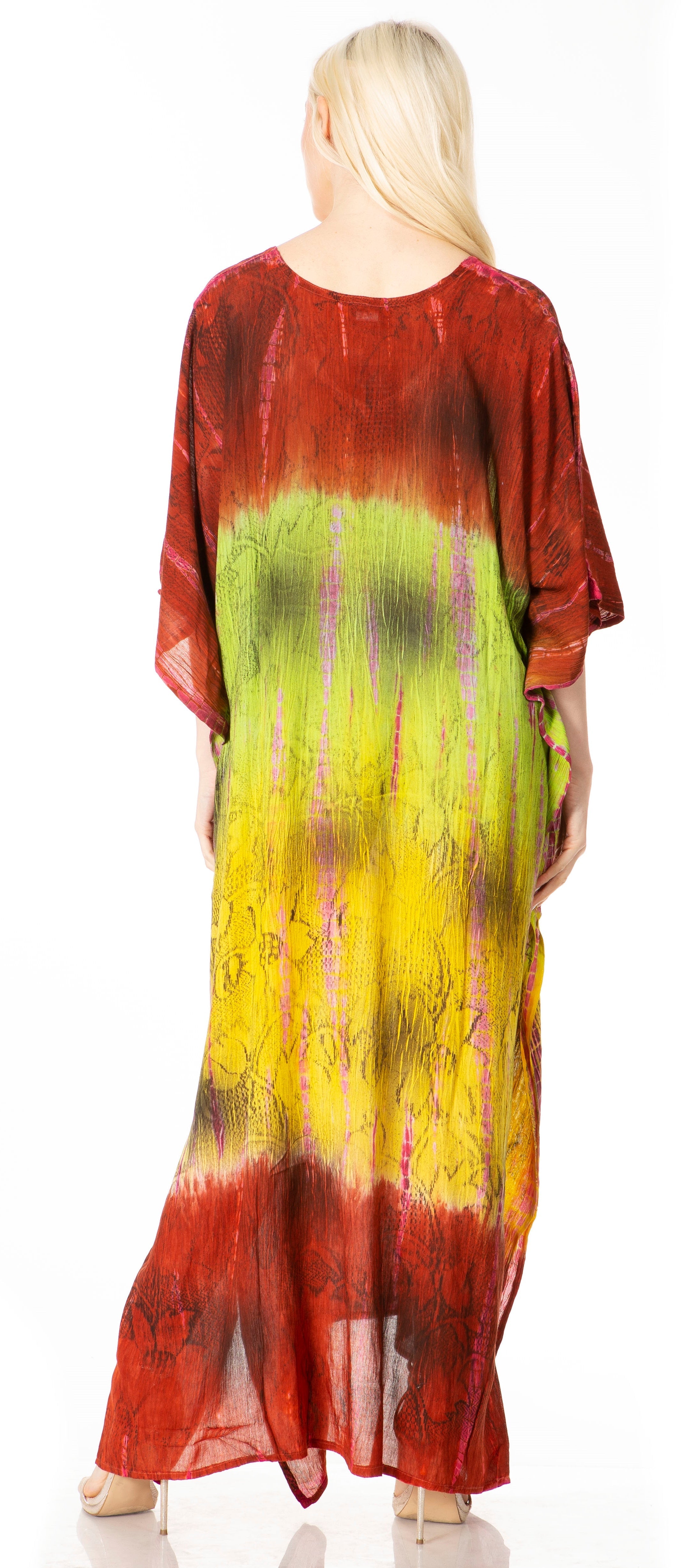 Woman wearing a colorful tie-dye dress with a white background
