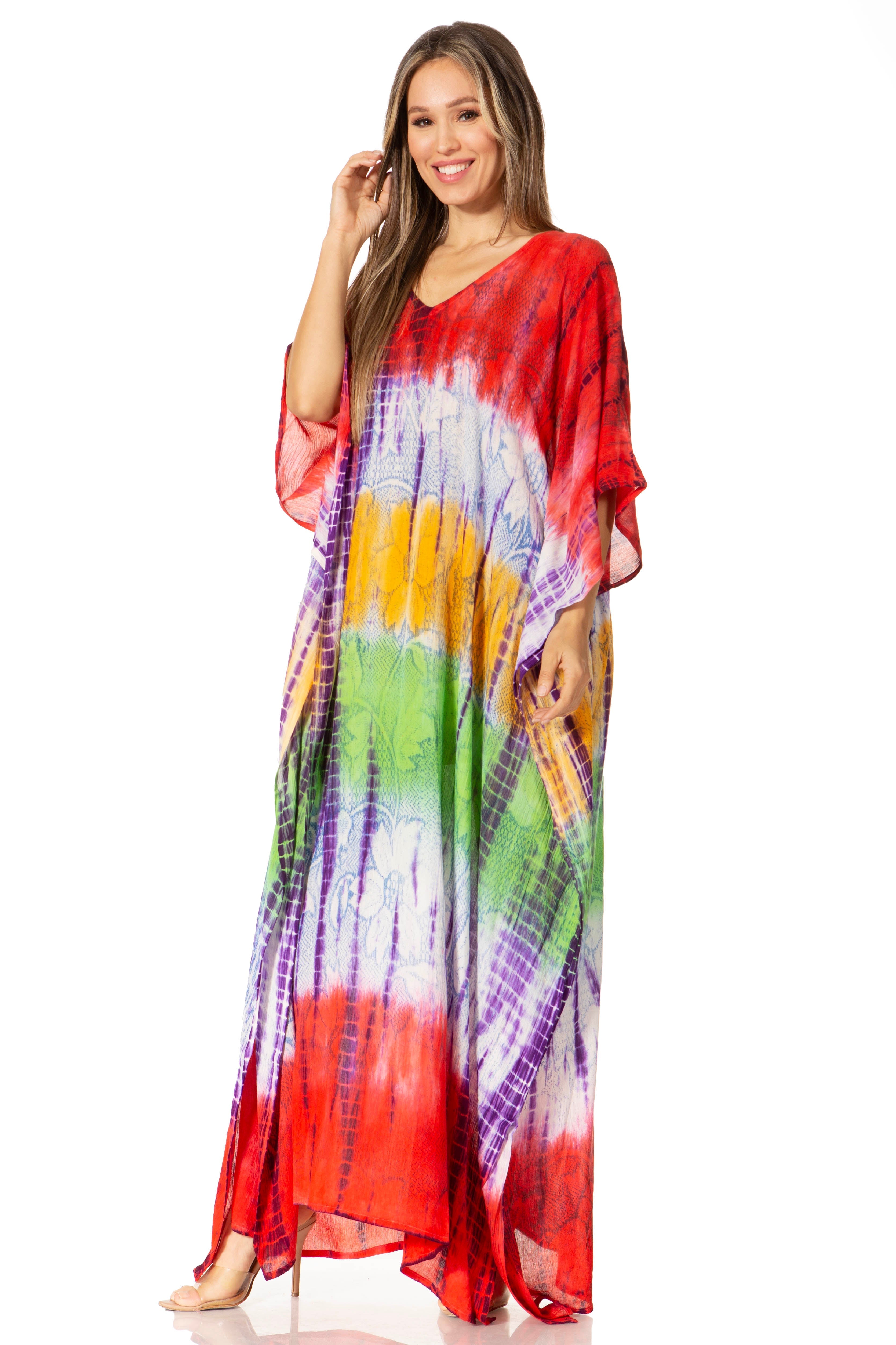 Woman wearing a colorful tie-dye dress on a white background