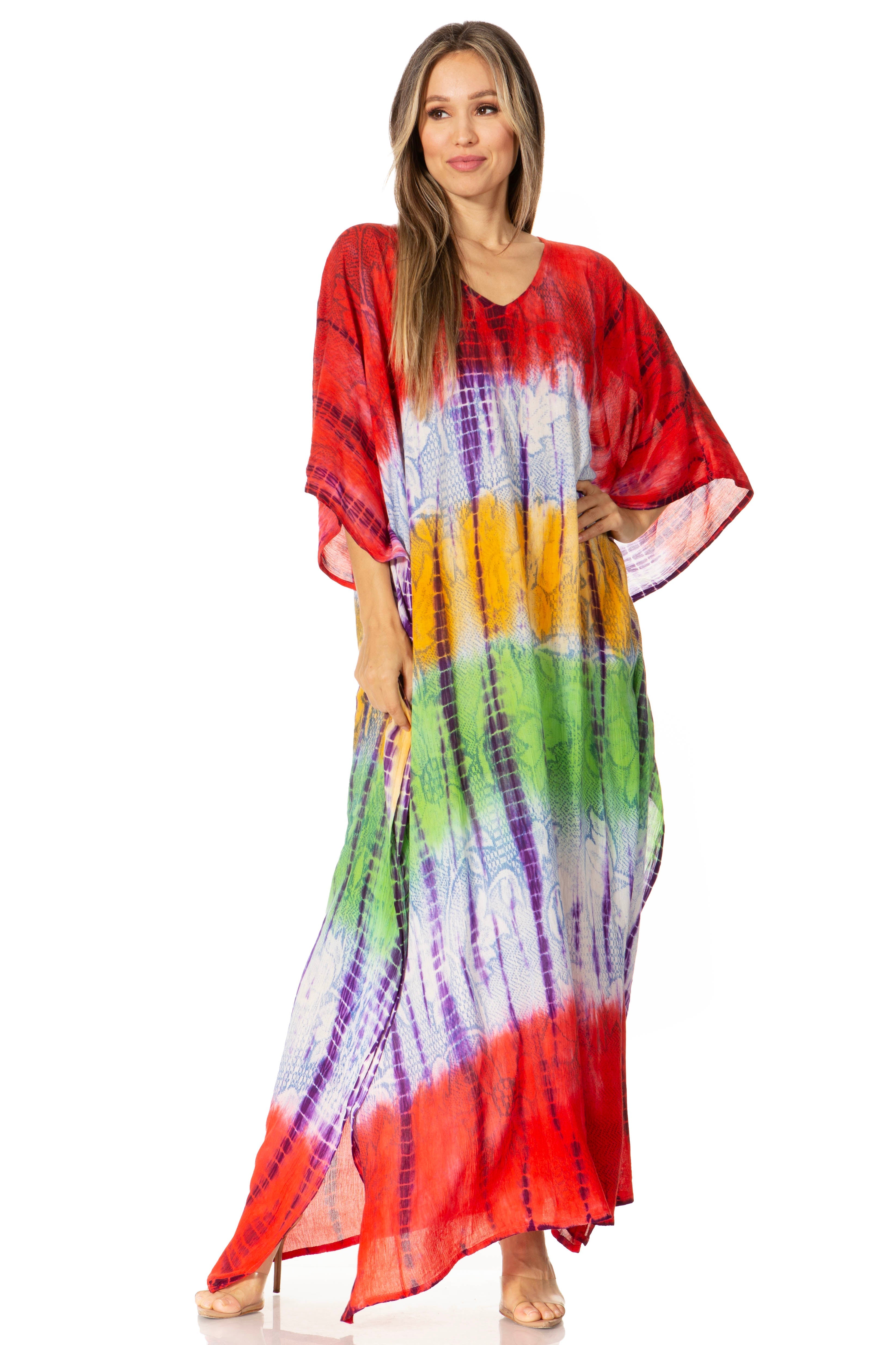Woman wearing a colorful tie-dye dress on a white background