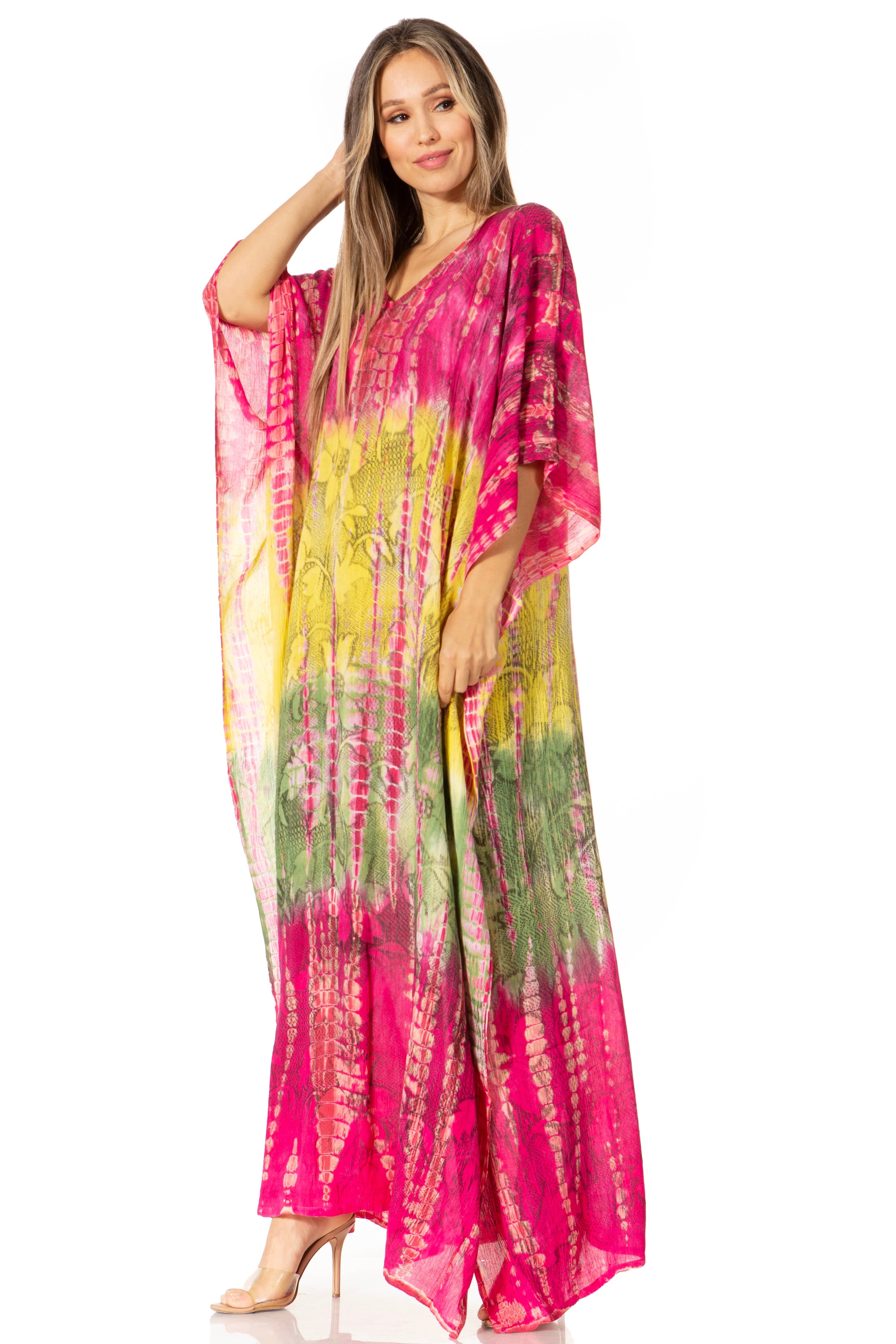 Woman wearing a colorful tie-dye dress on a white background