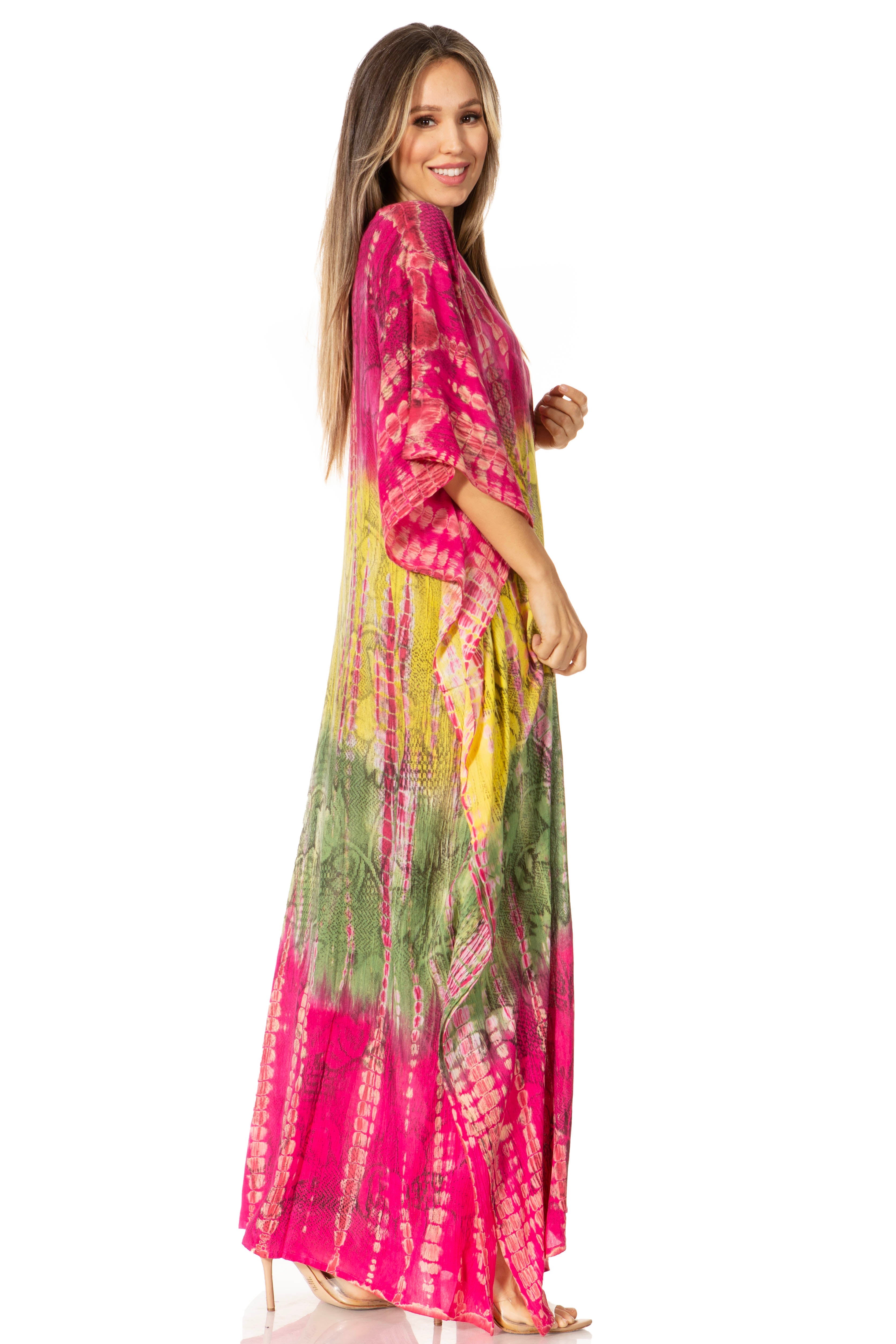 Woman wearing a colorful tie-dye dress on a white background