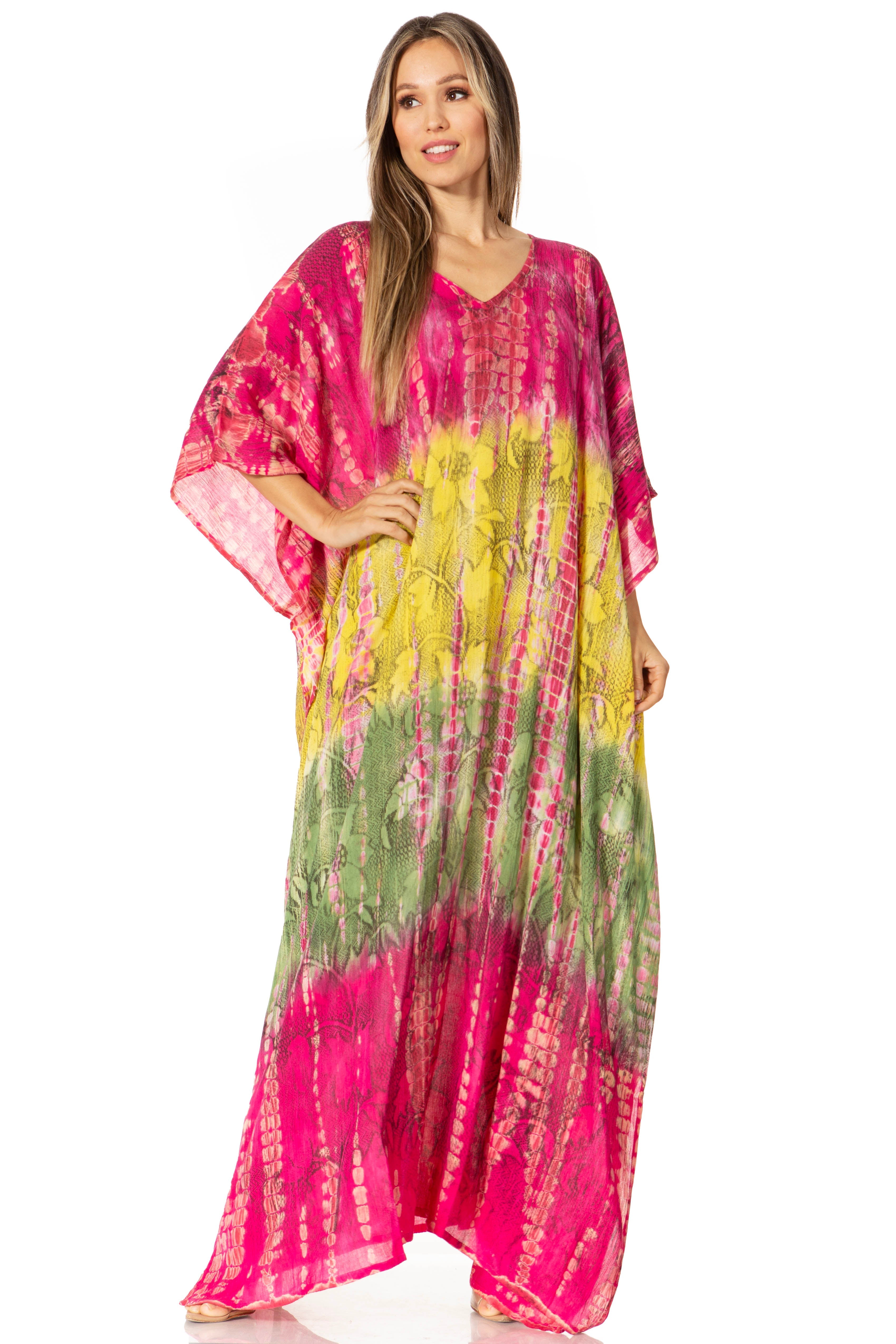 Woman wearing a colorful tie-dye dress on a white background