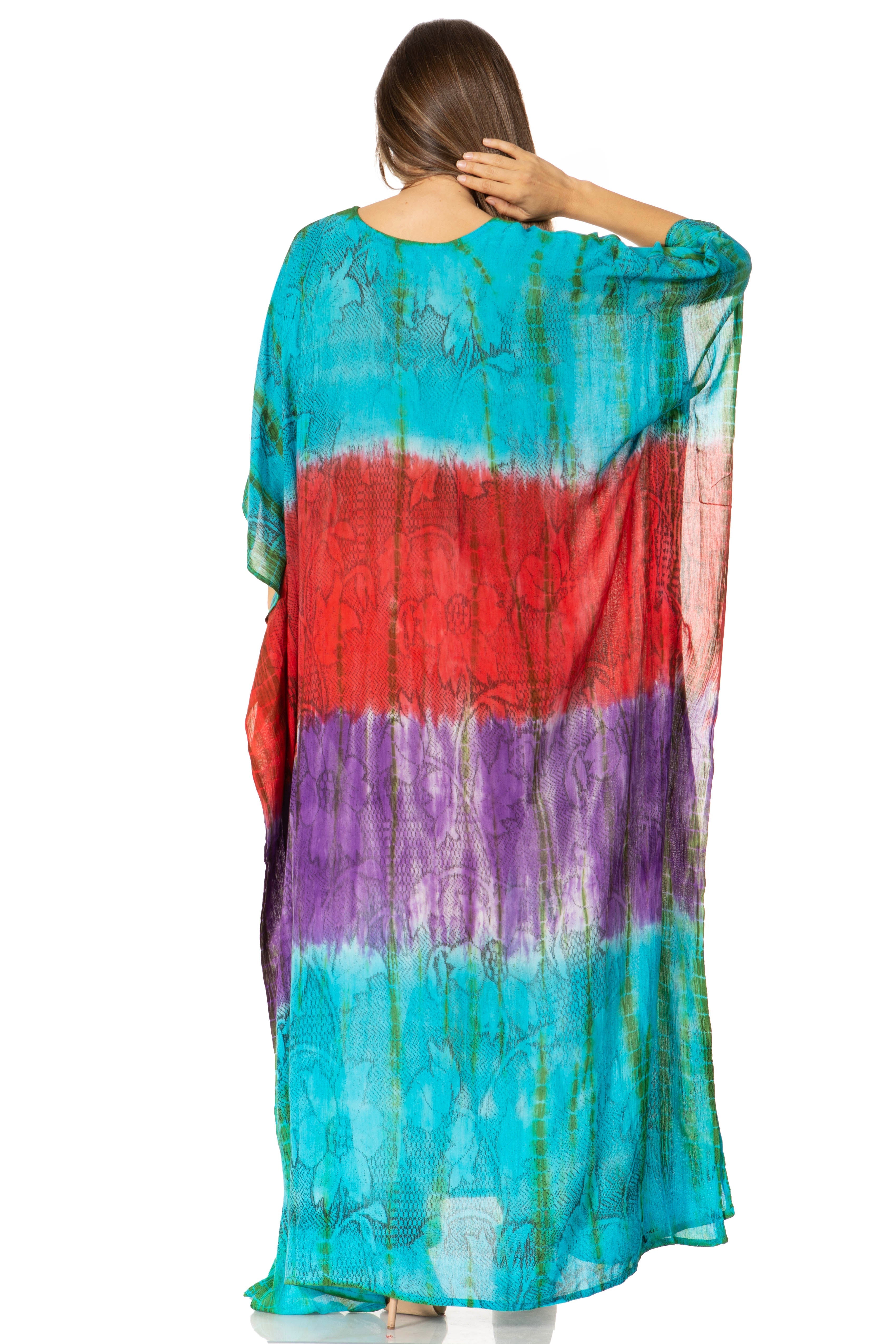 Multicolored tie-dye dress worn by a person on a white background