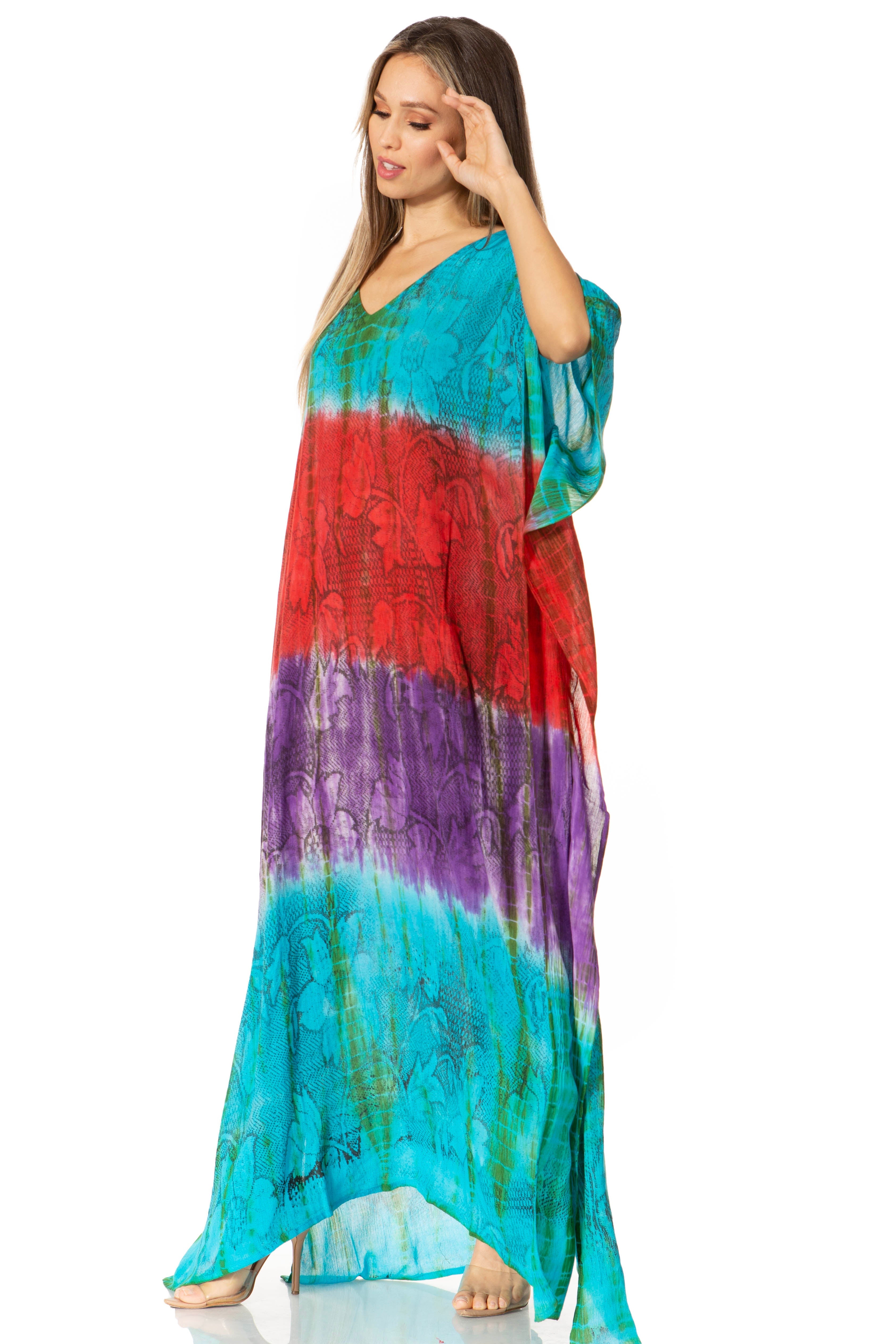 Woman wearing a colorful tie-dye dress on a white background