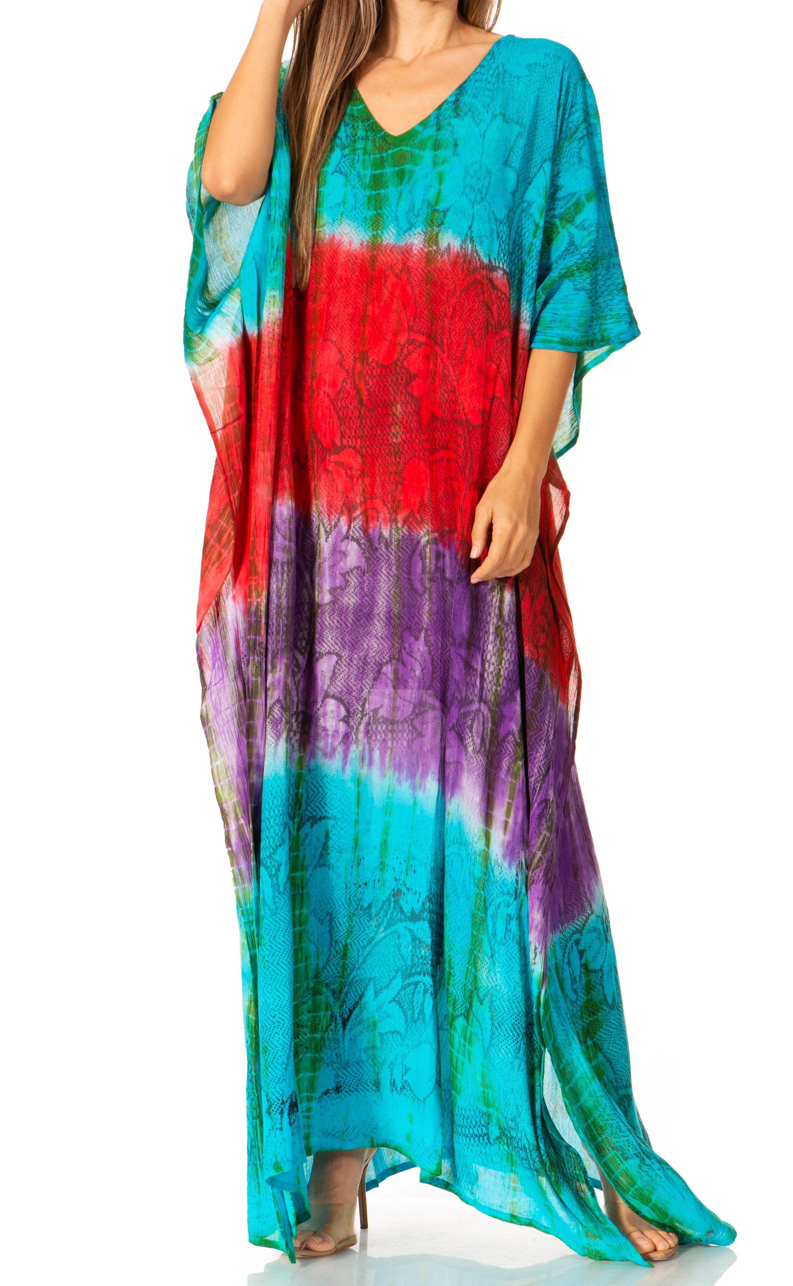 Multicolored tie-dye dress worn by a model on a white background