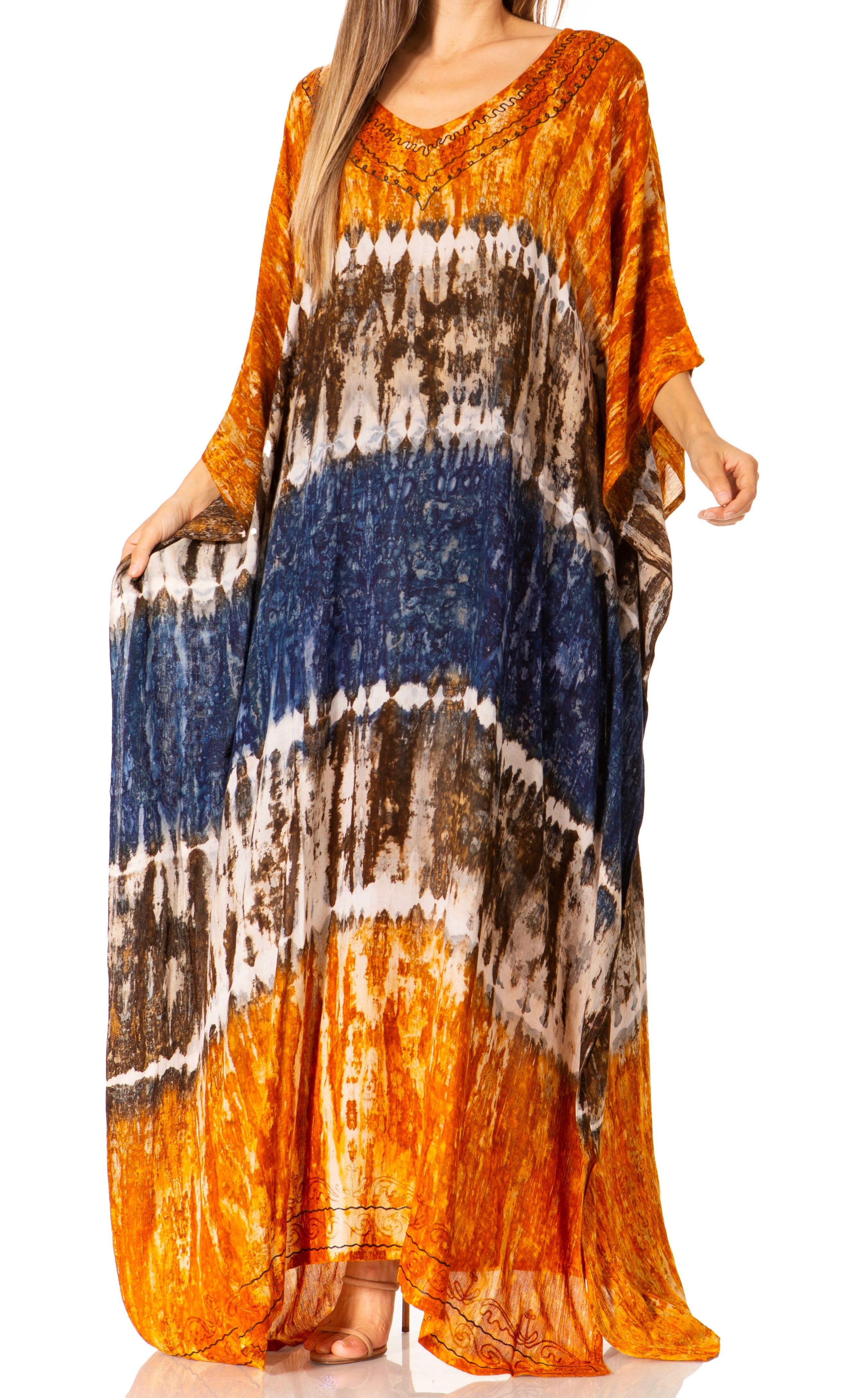 Long, tie-dye dress with orange, blue, and brown patterns on a white background