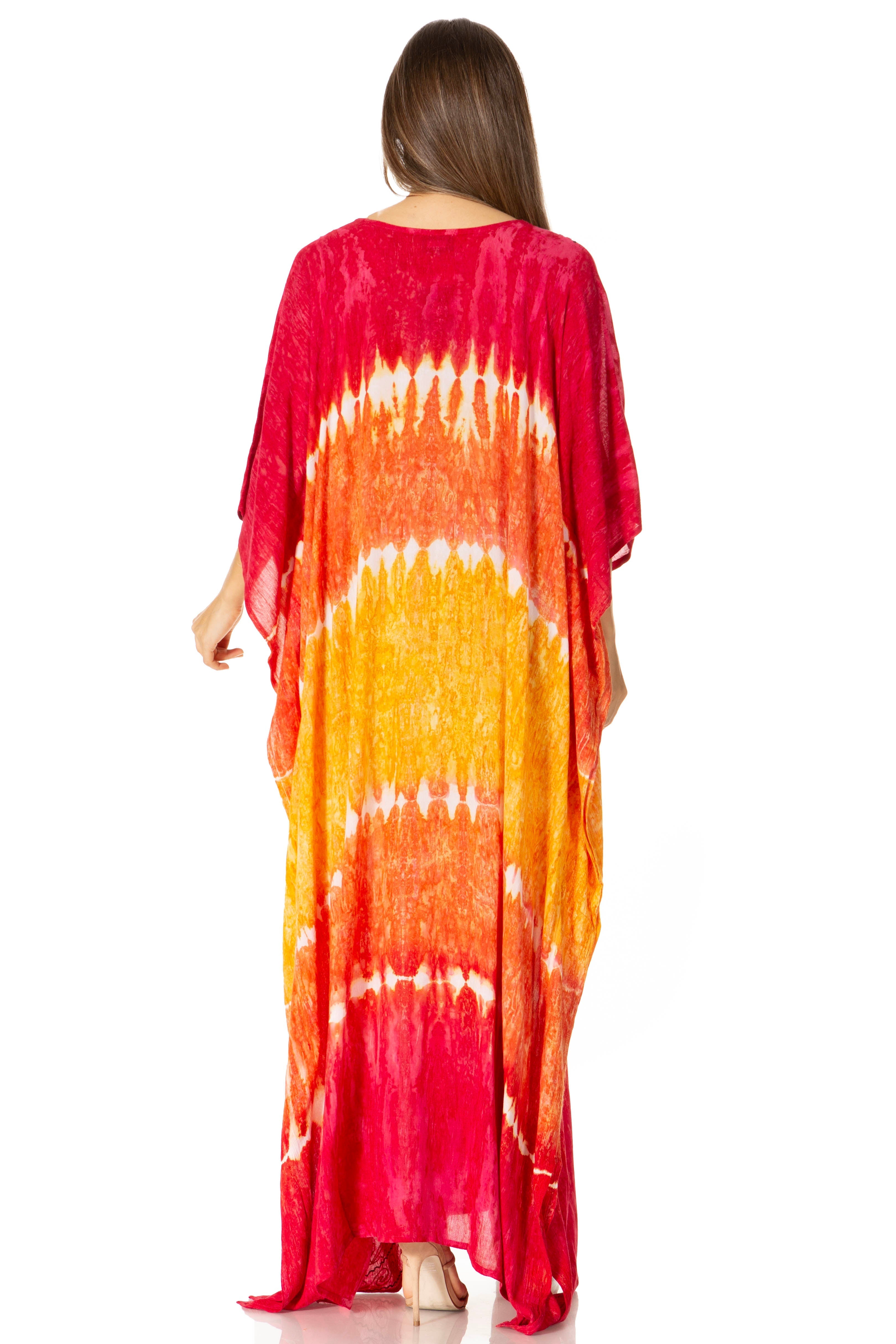 Woman wearing a tie-dye dress with red, orange, and yellow gradient on a white background