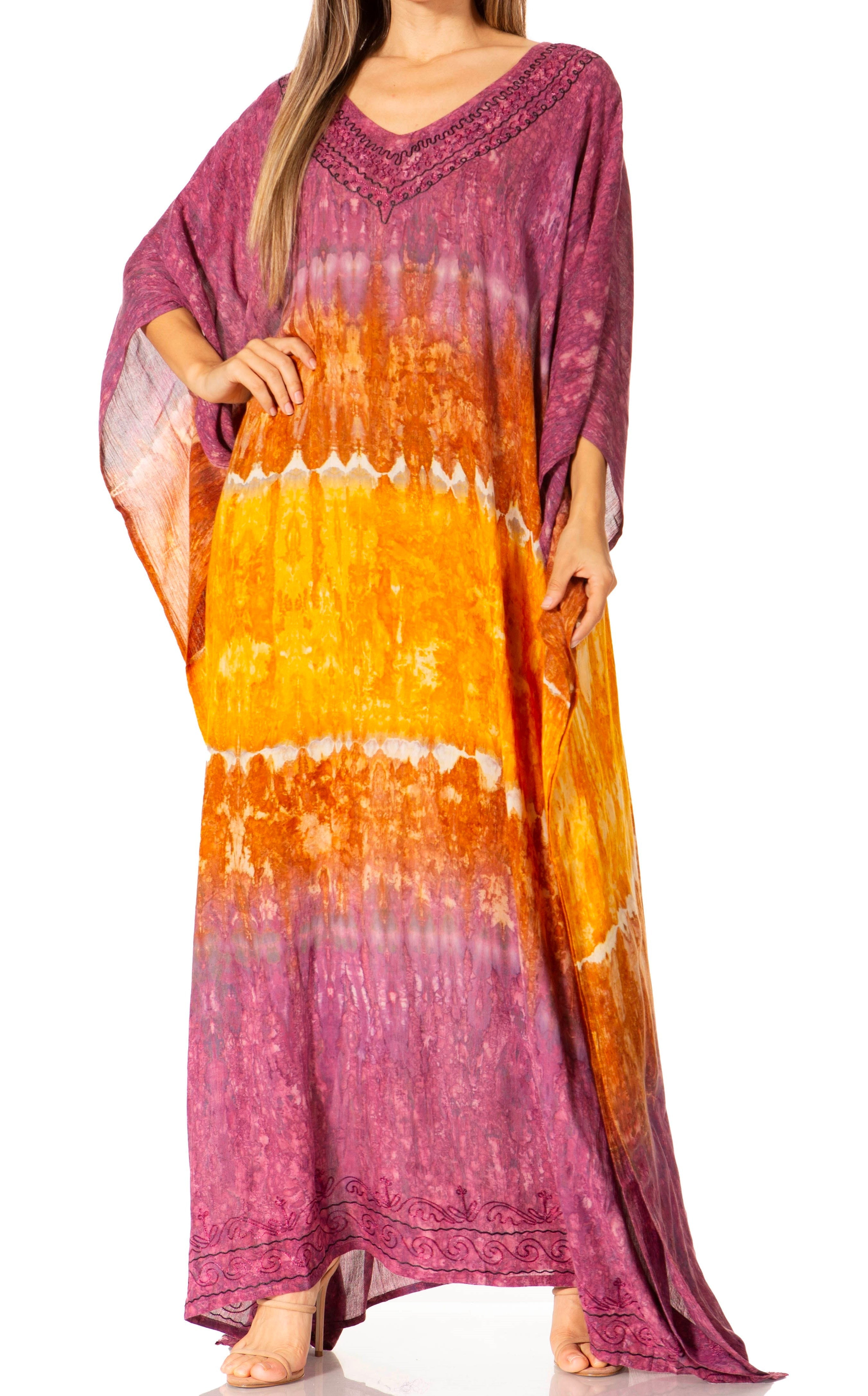 Long, tie-dye dress with a gradient from purple to orange on a white background