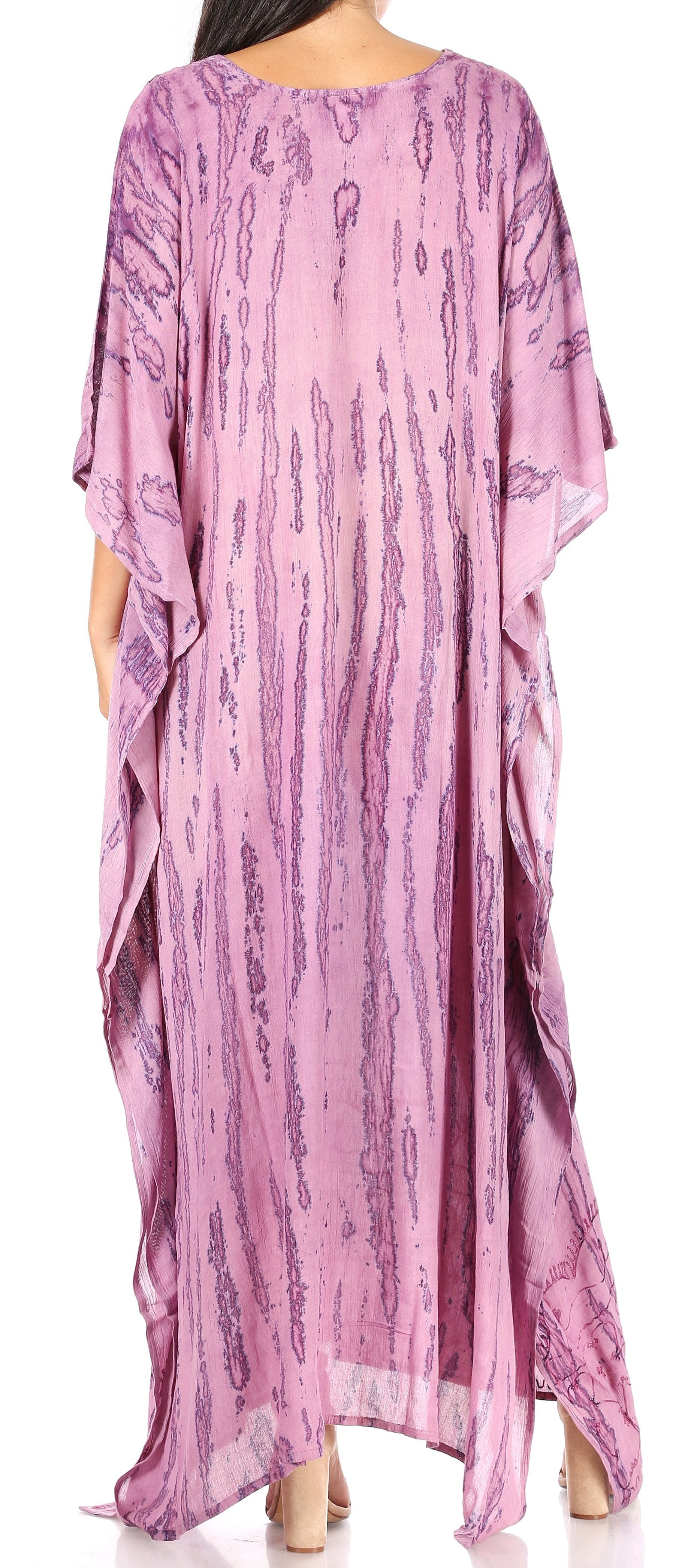 Pink patterned dress with a flowing design on a white background