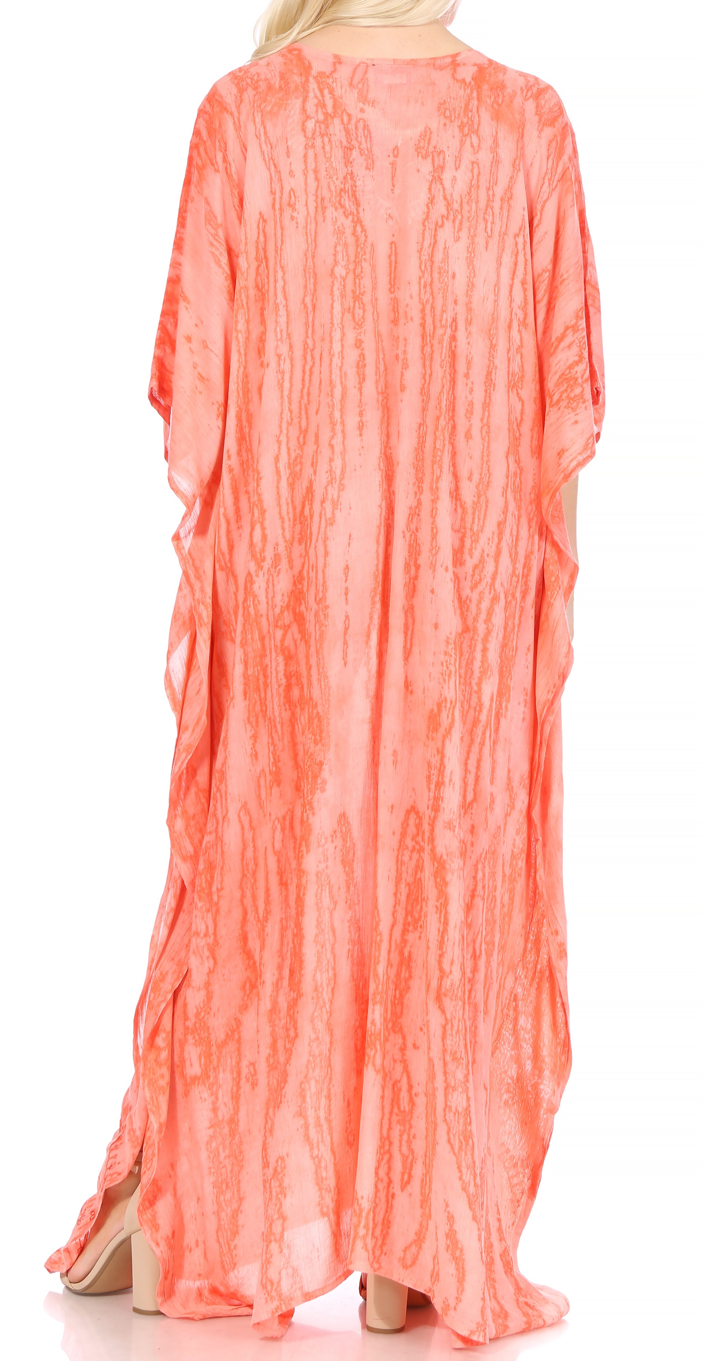 Coral-colored long dress with a sheer overlay on a white background