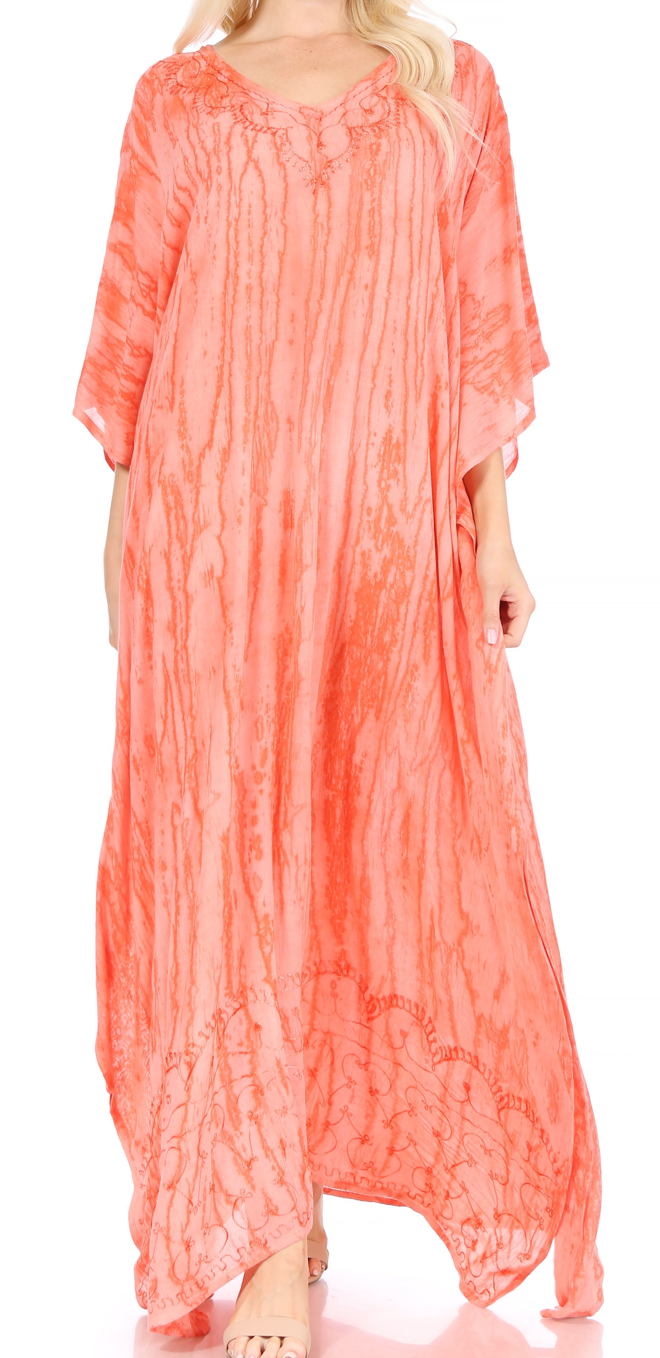 Coral long dress with lace details on a white background