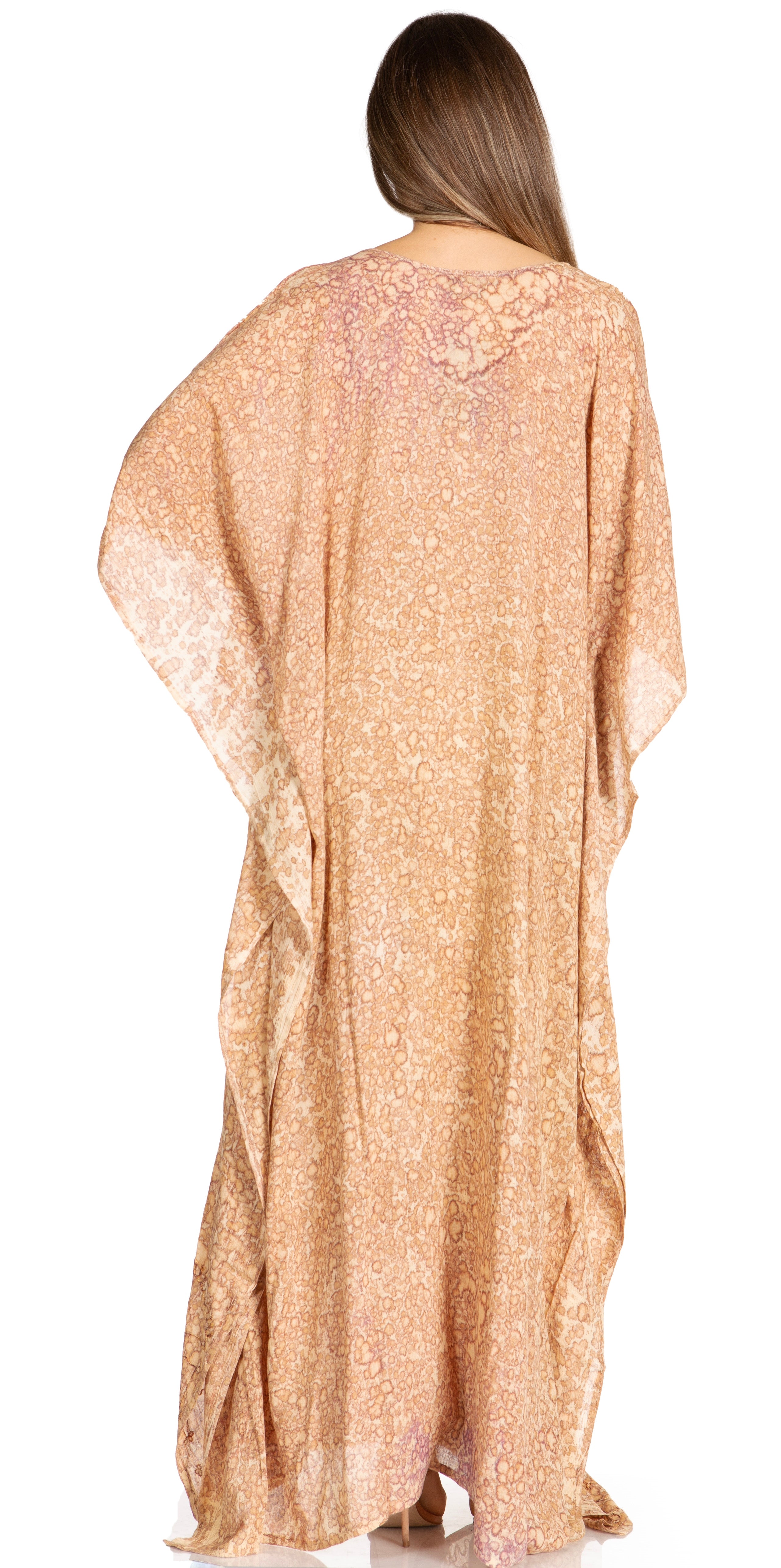 Woman wearing a beige floral dress with a white background