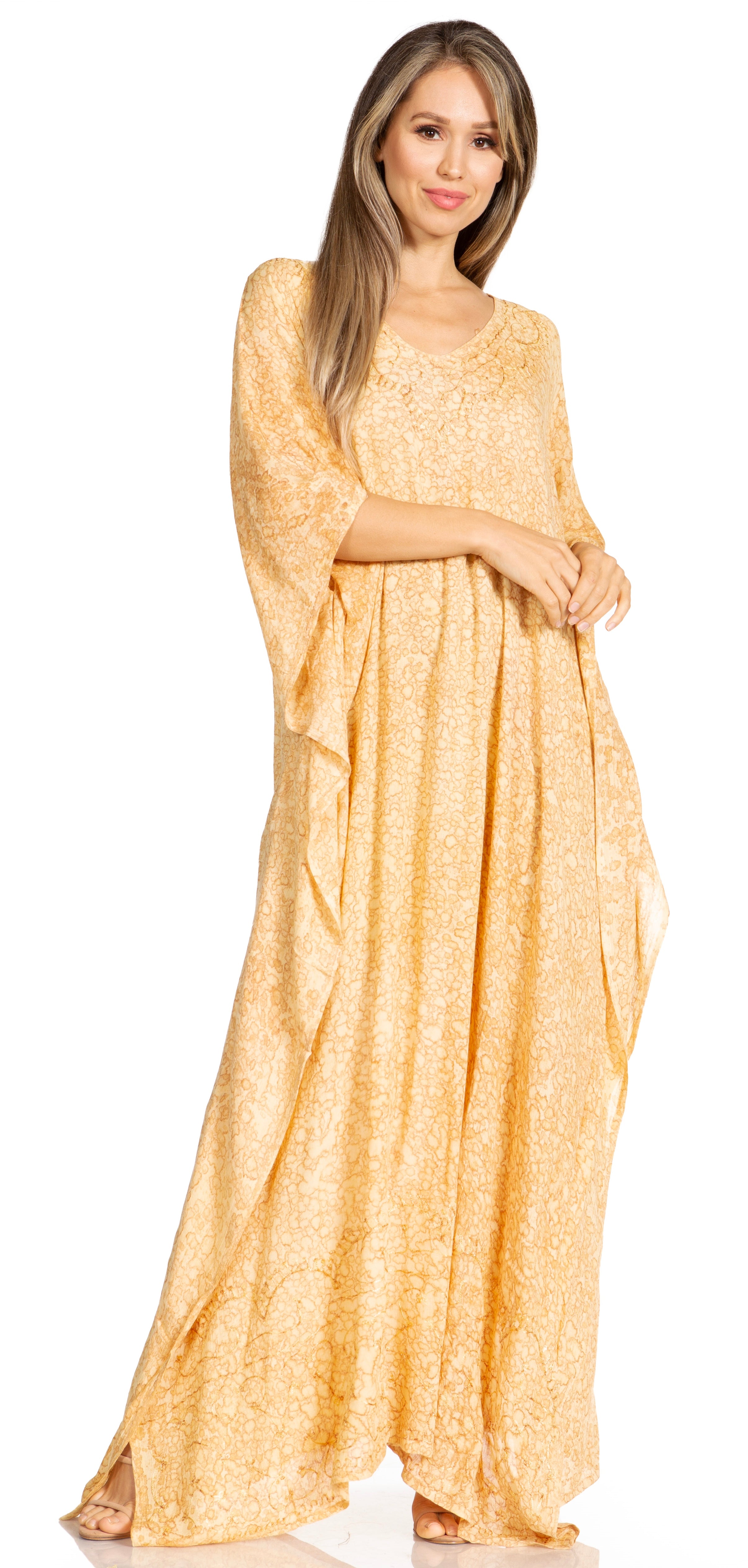 Woman wearing a long yellow dress on a white background