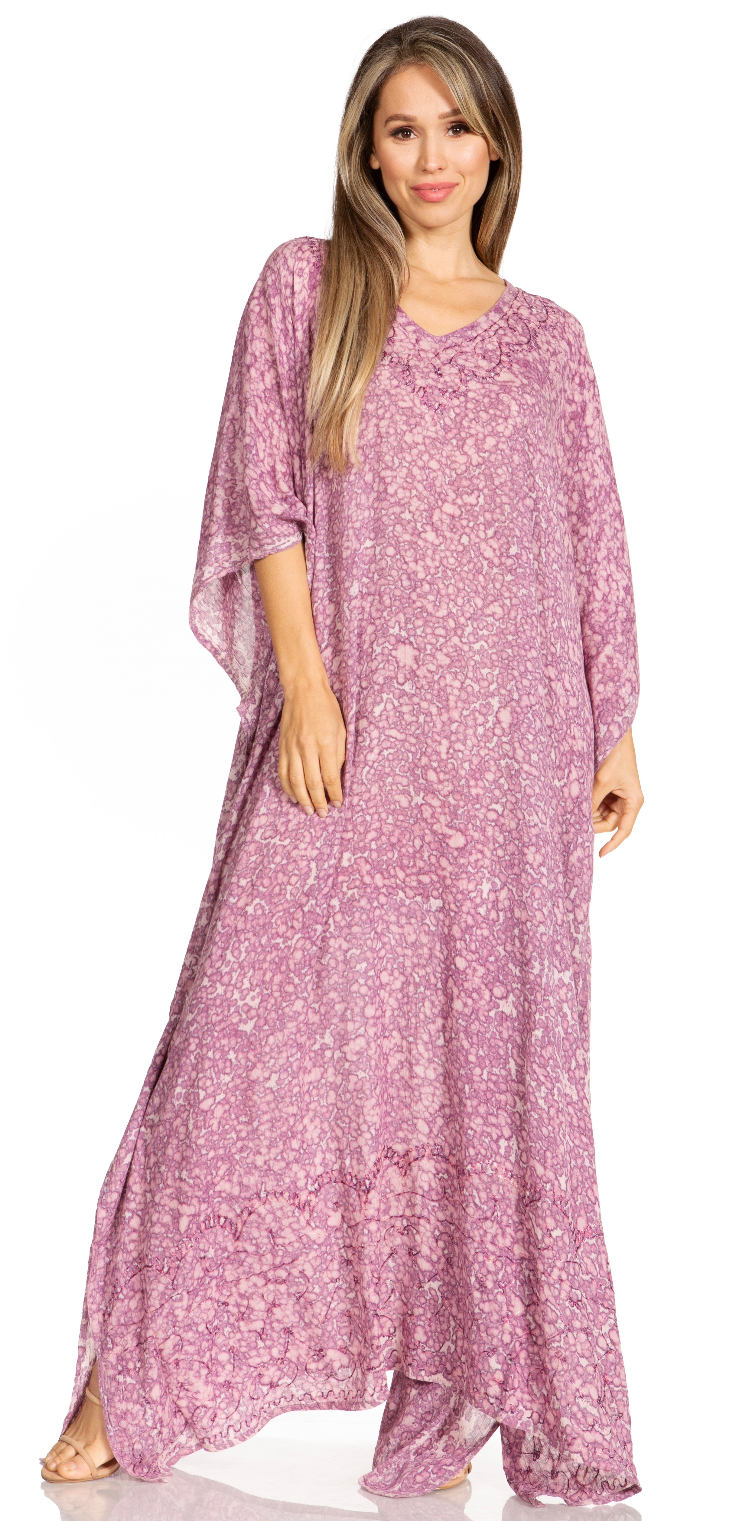 Woman wearing a pink floral dress on a white background