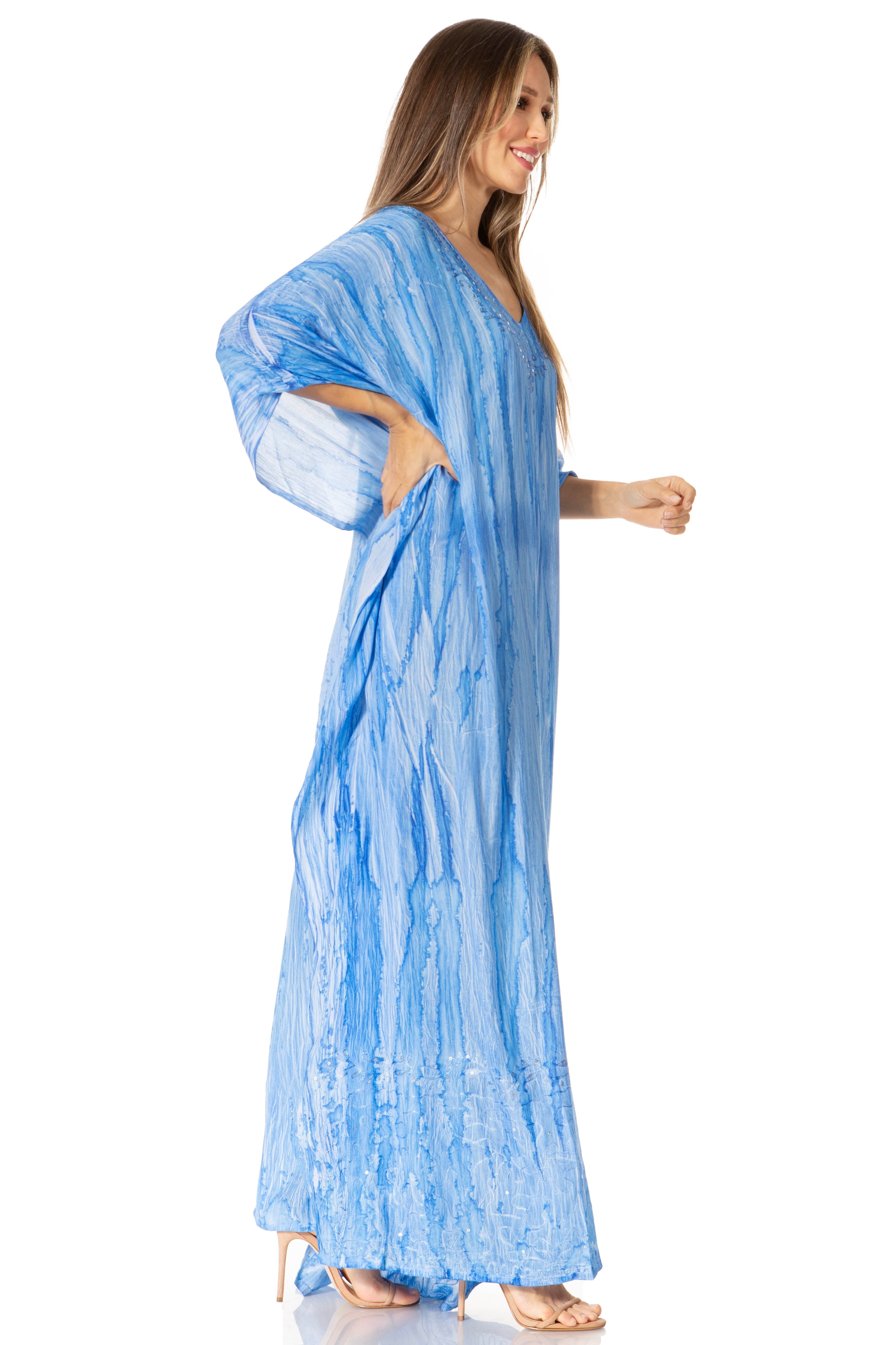 Woman wearing a blue dress with a white background