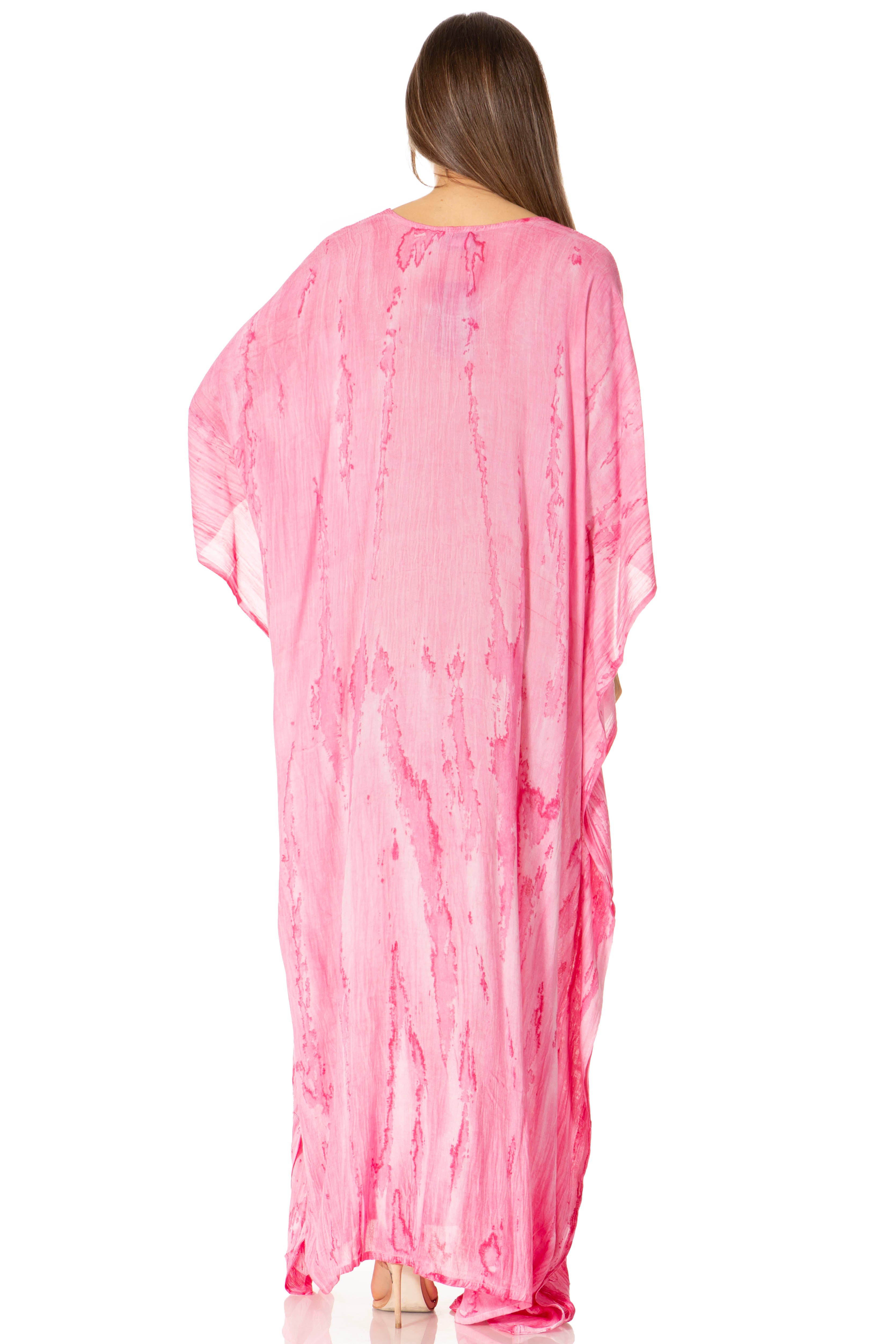 Pink caftan worn by a model on a white background