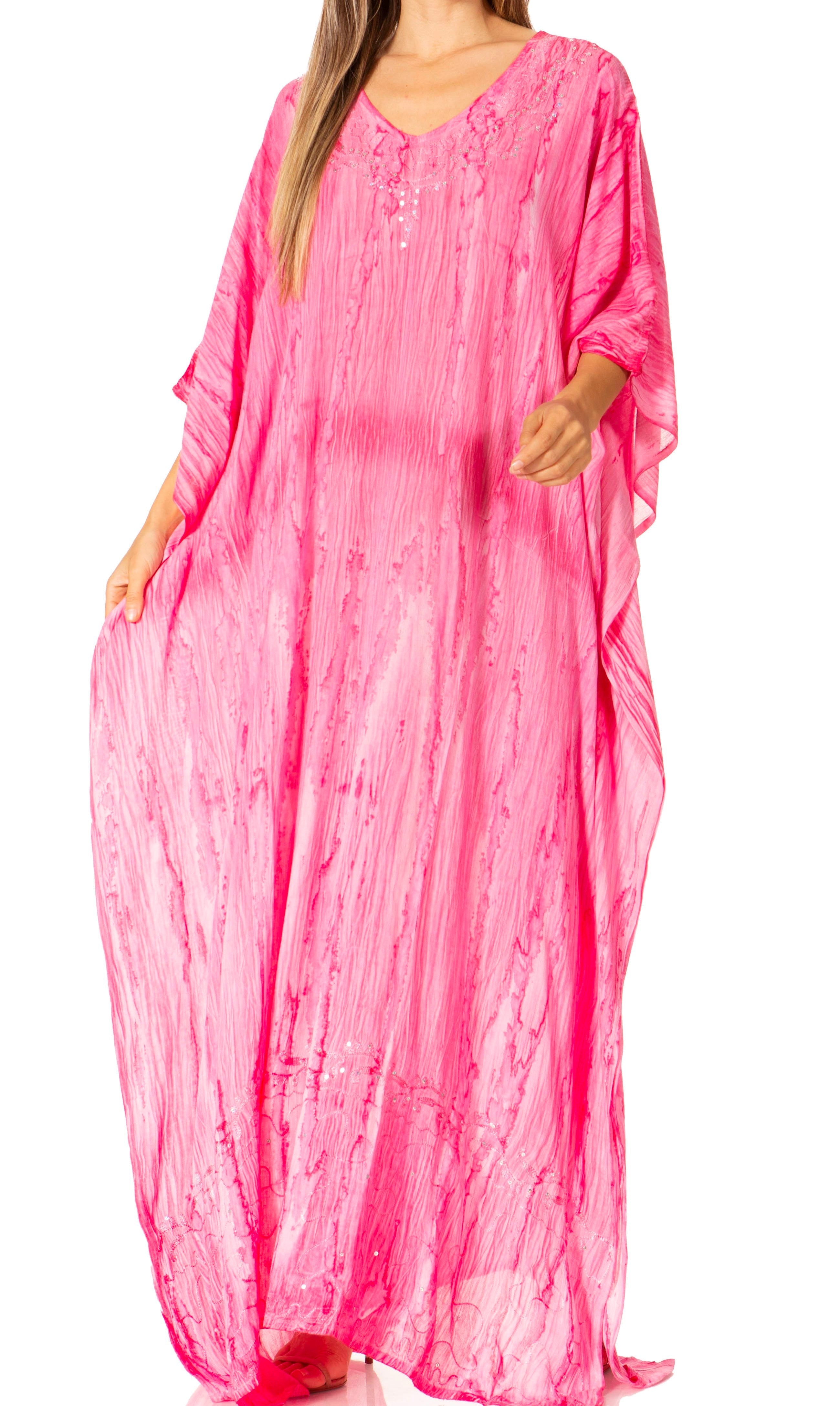 Pink long dress with a subtle pattern on a white background