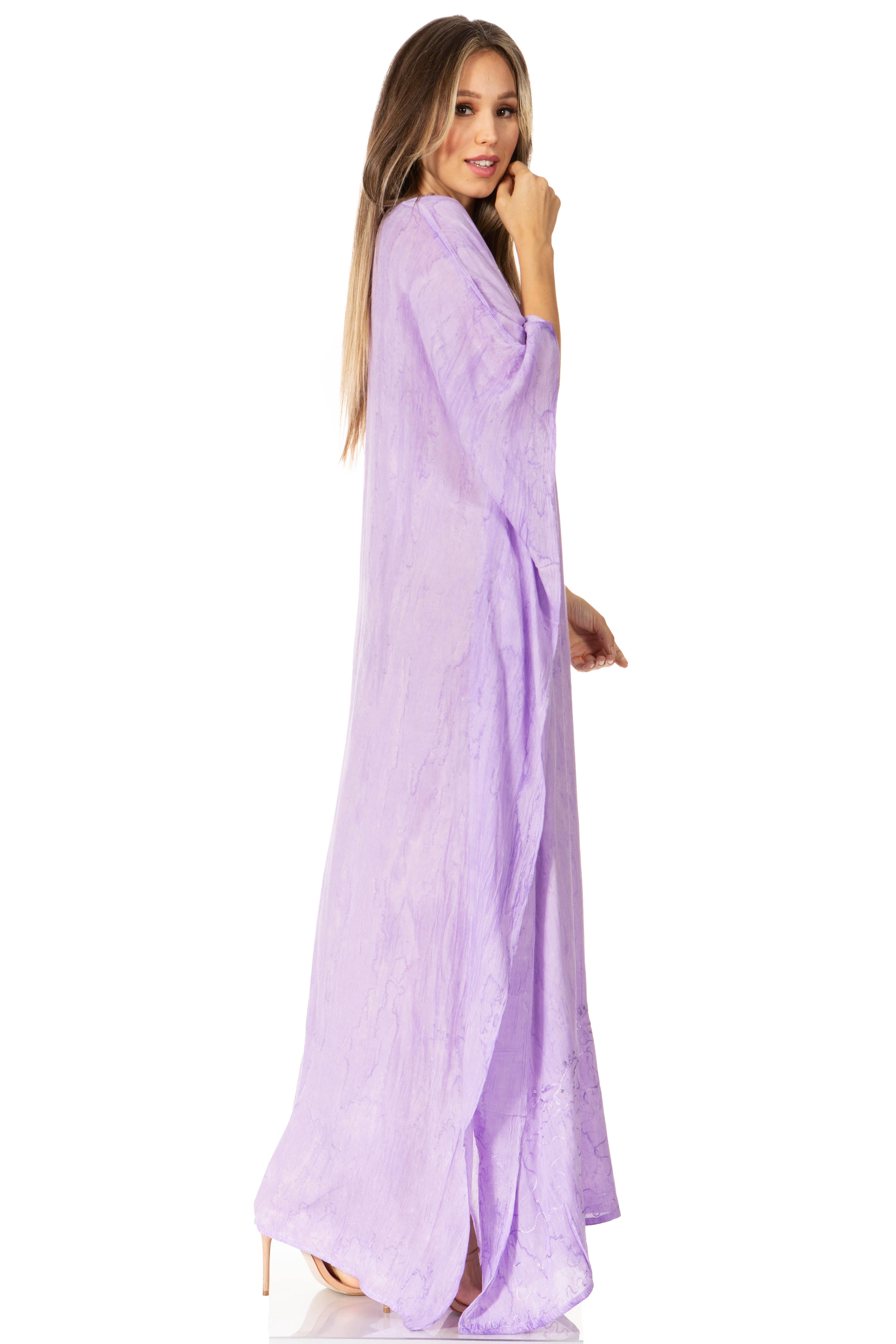 Woman wearing a long lavender dress on a white background
