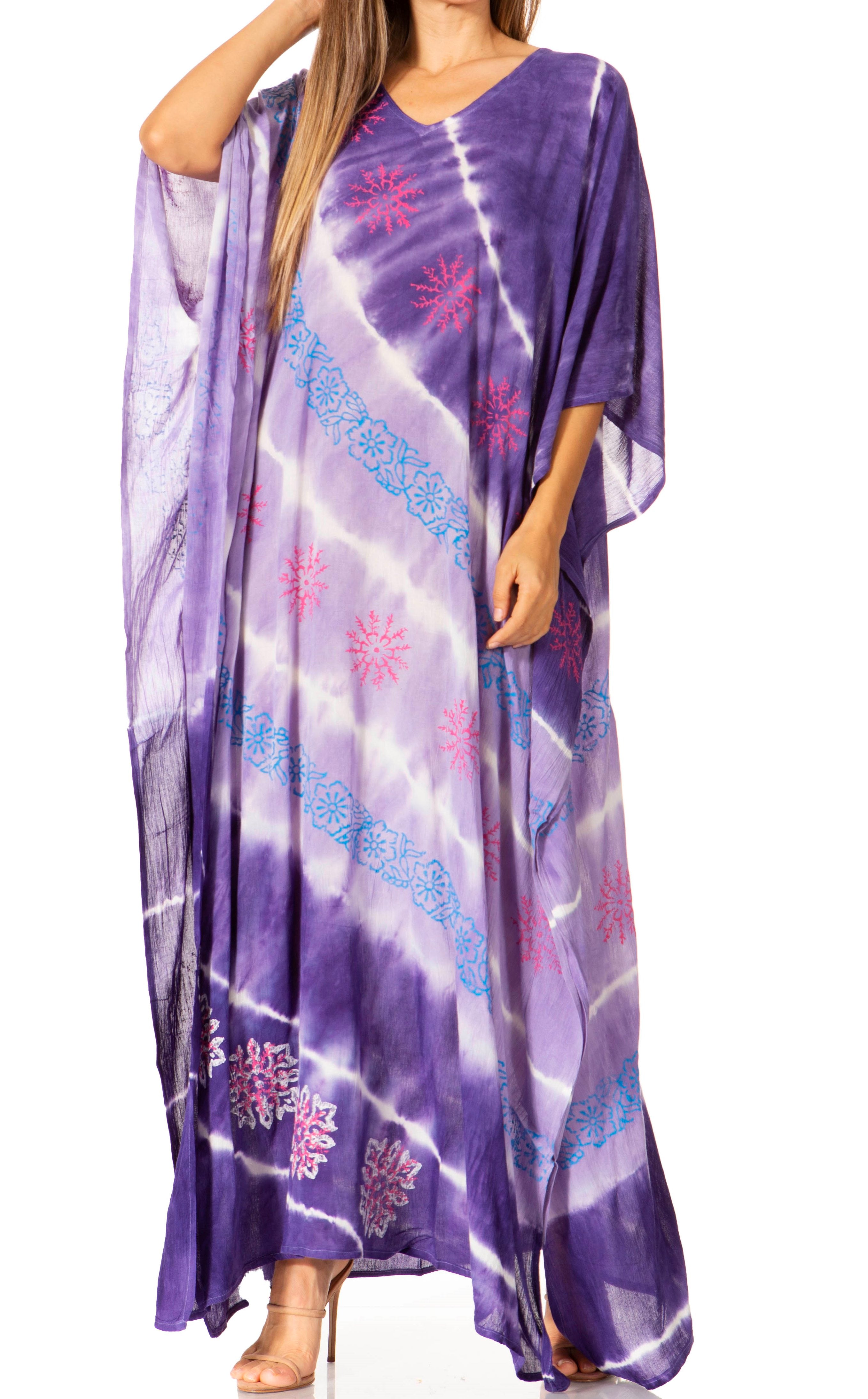 Purple tie-dye dress with floral patterns on a white background
