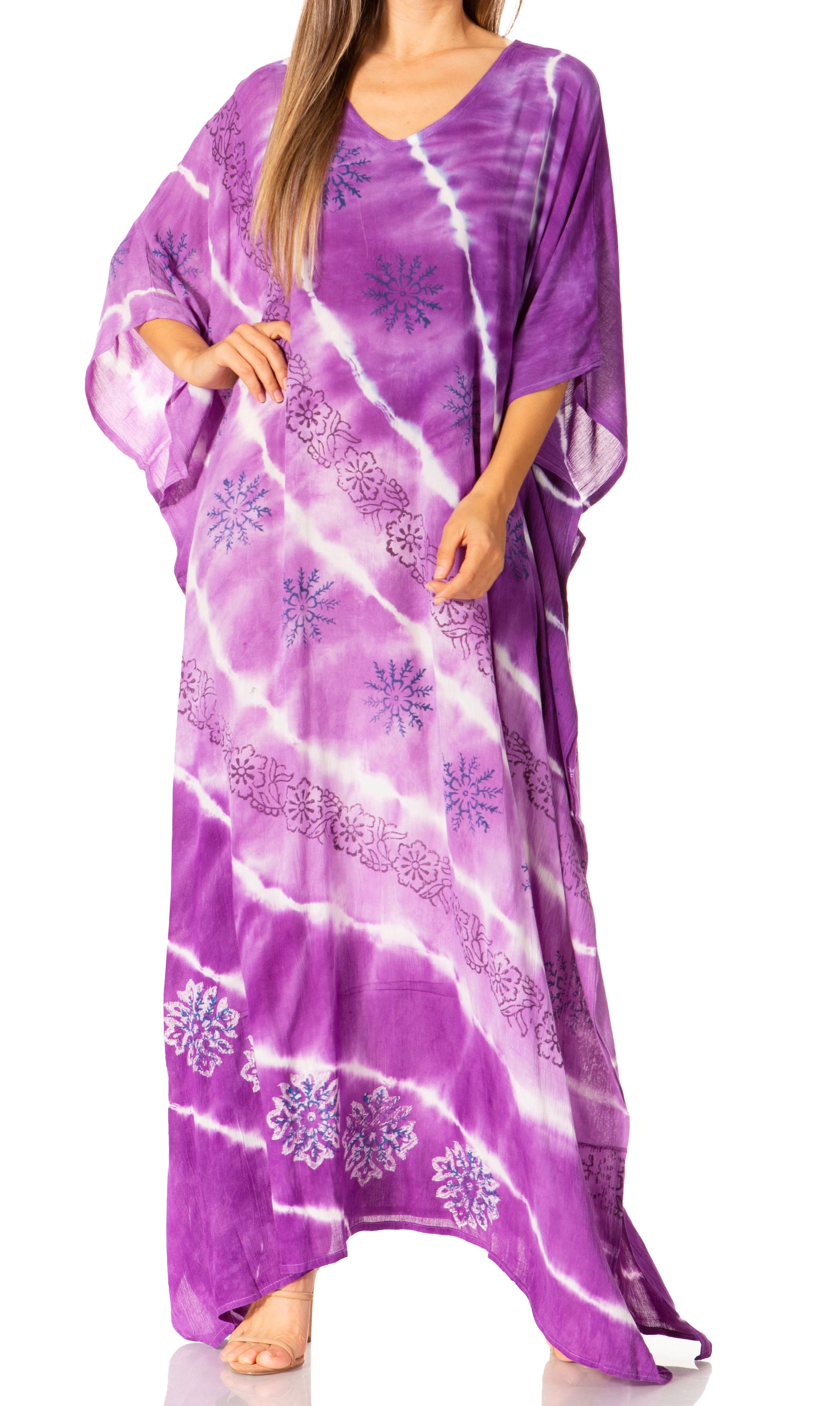Purple tie-dye dress with floral patterns on a white background